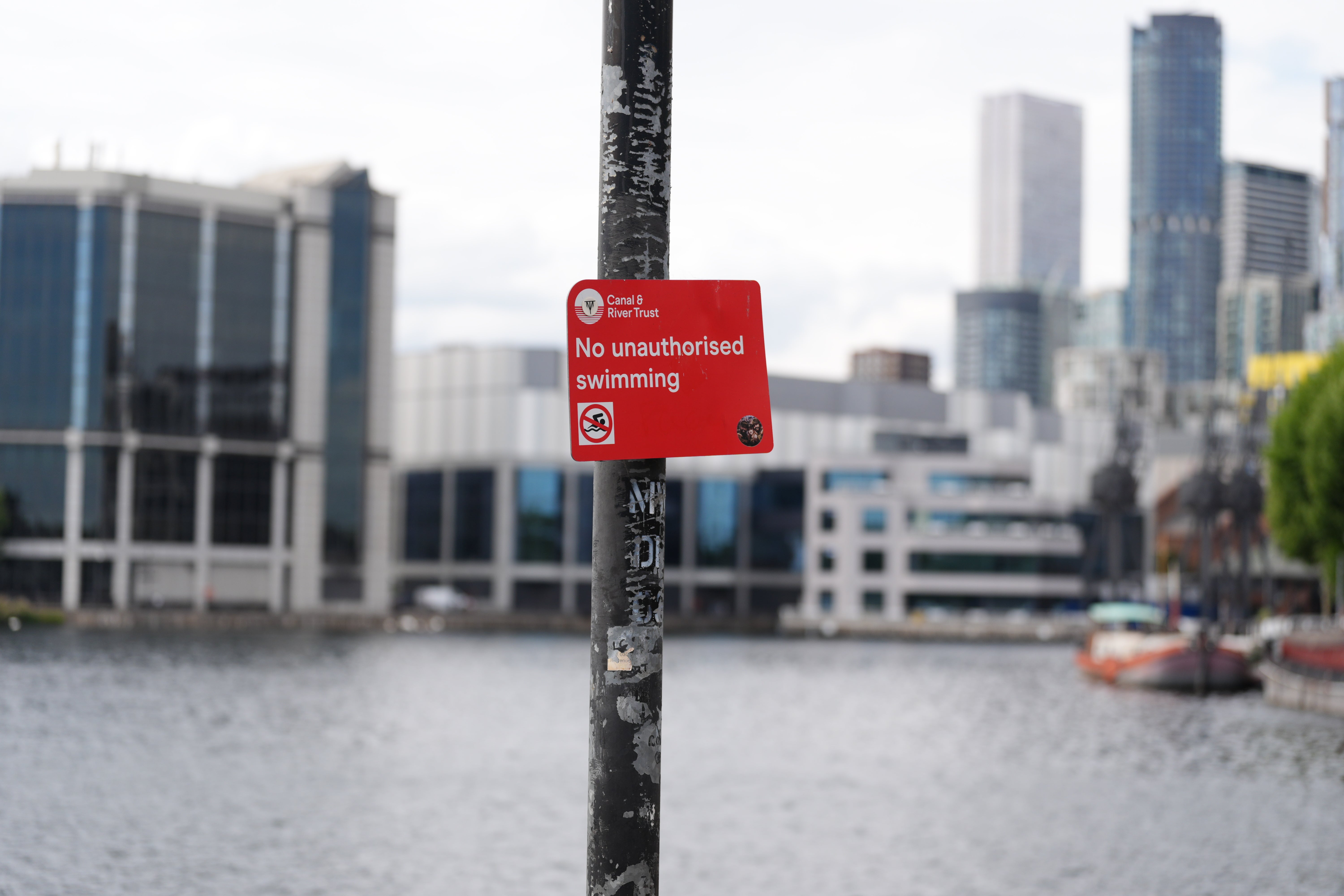 A sign that warns against unauthorised swimming at Millwall Outer Dock (PA)