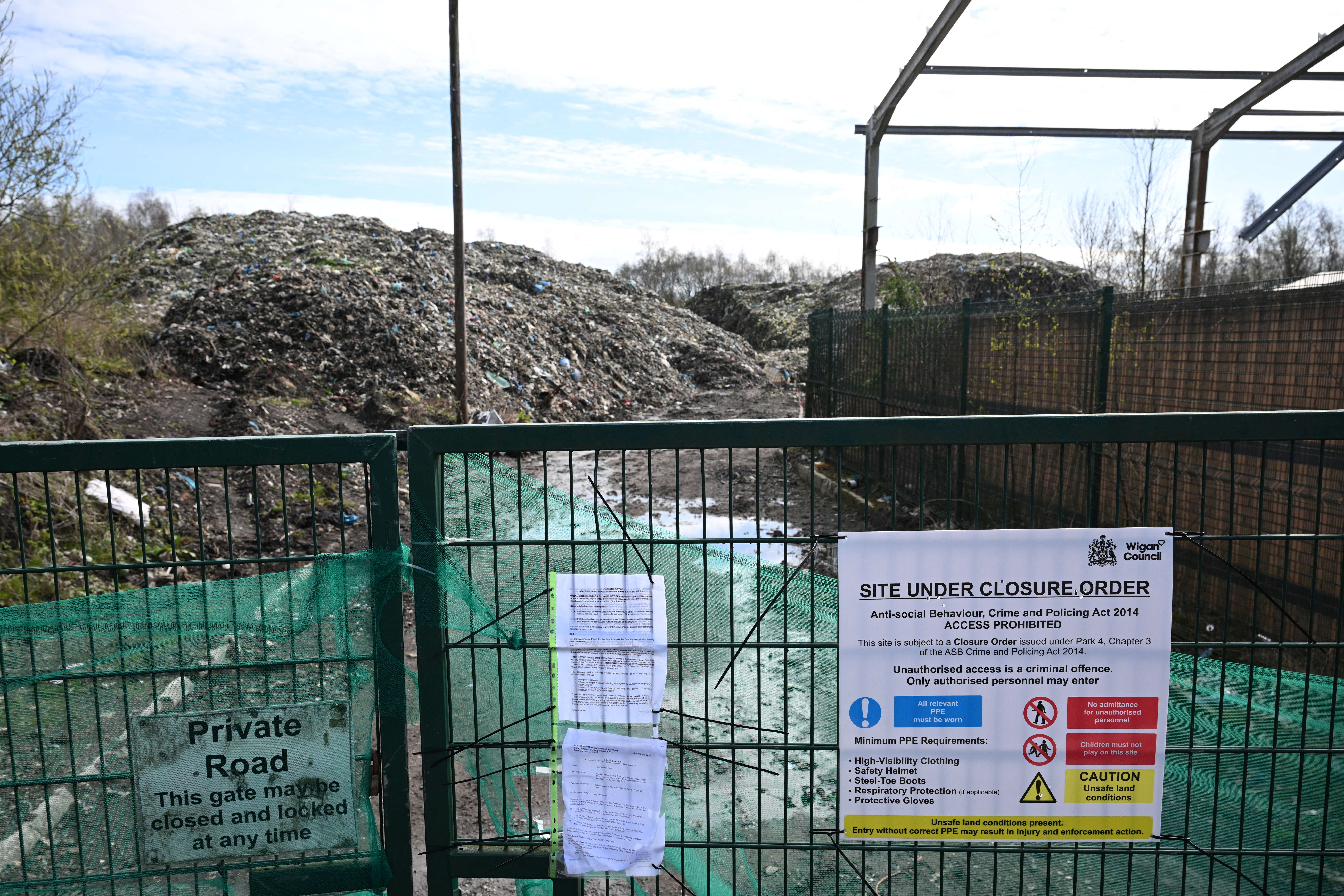 An illegal rubbish dump, estimated to contain 25,000 tonnes of waste and which is due to be cleared by the Environment Agency, is pictured in Bickershaw, near Wigan