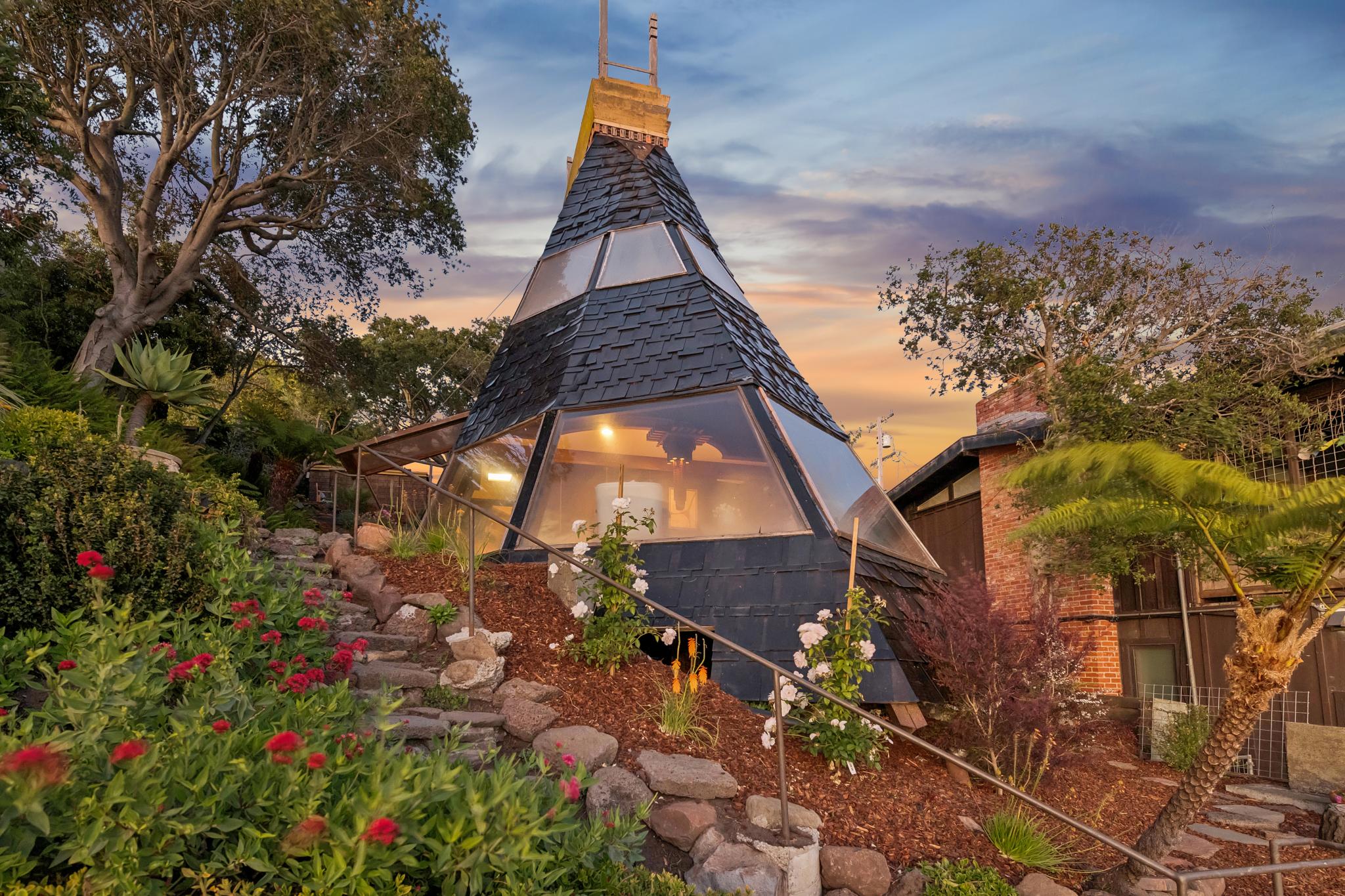 The unique home, made of amber-colored plexiglass and shingles, overlooks San Francisco Bay and is listed for $899,000 (Open Homes Photography)