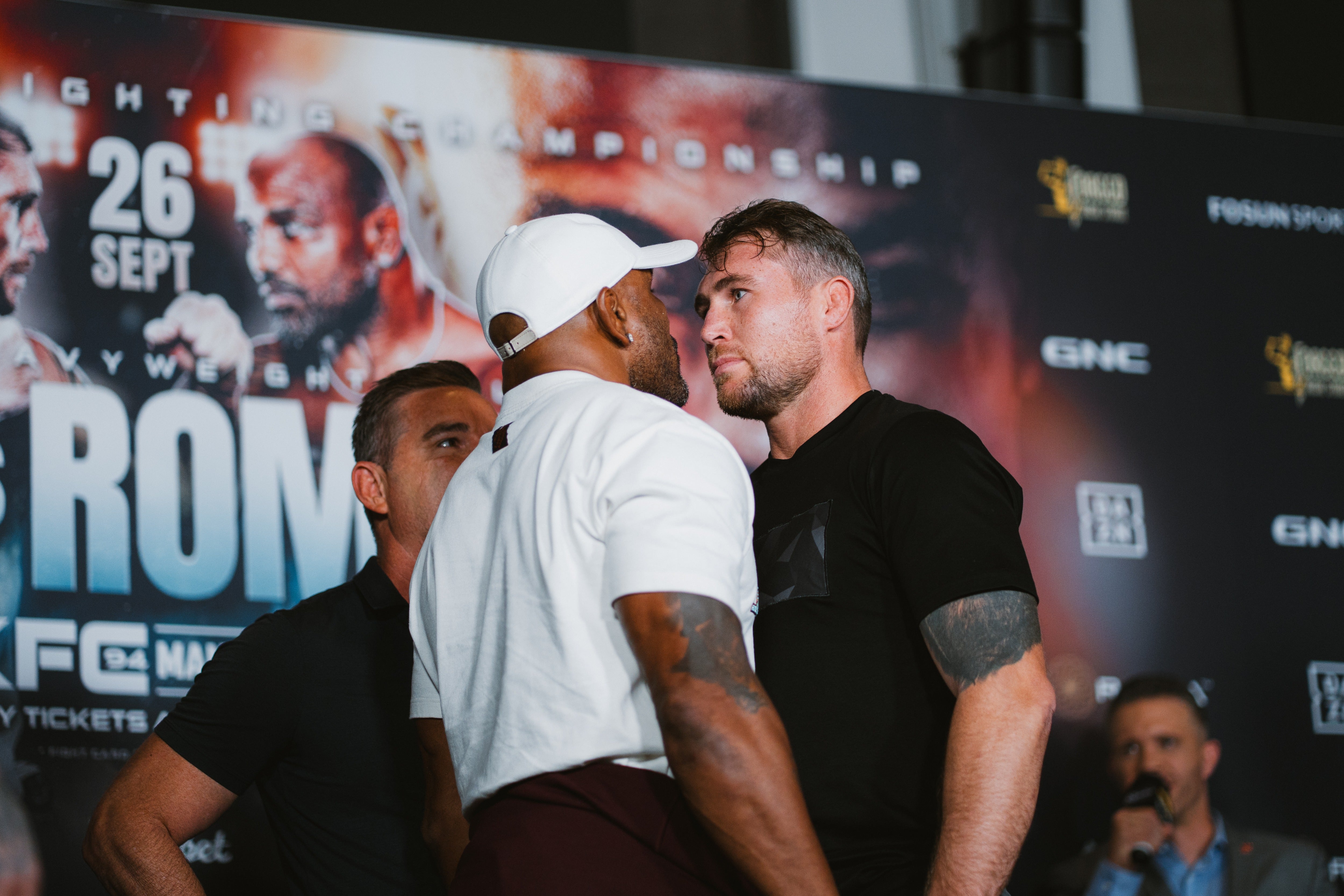 Darren Till (right) and Yoel Romero refused to unlock eyes in a stare-down that lasted over 200 seconds