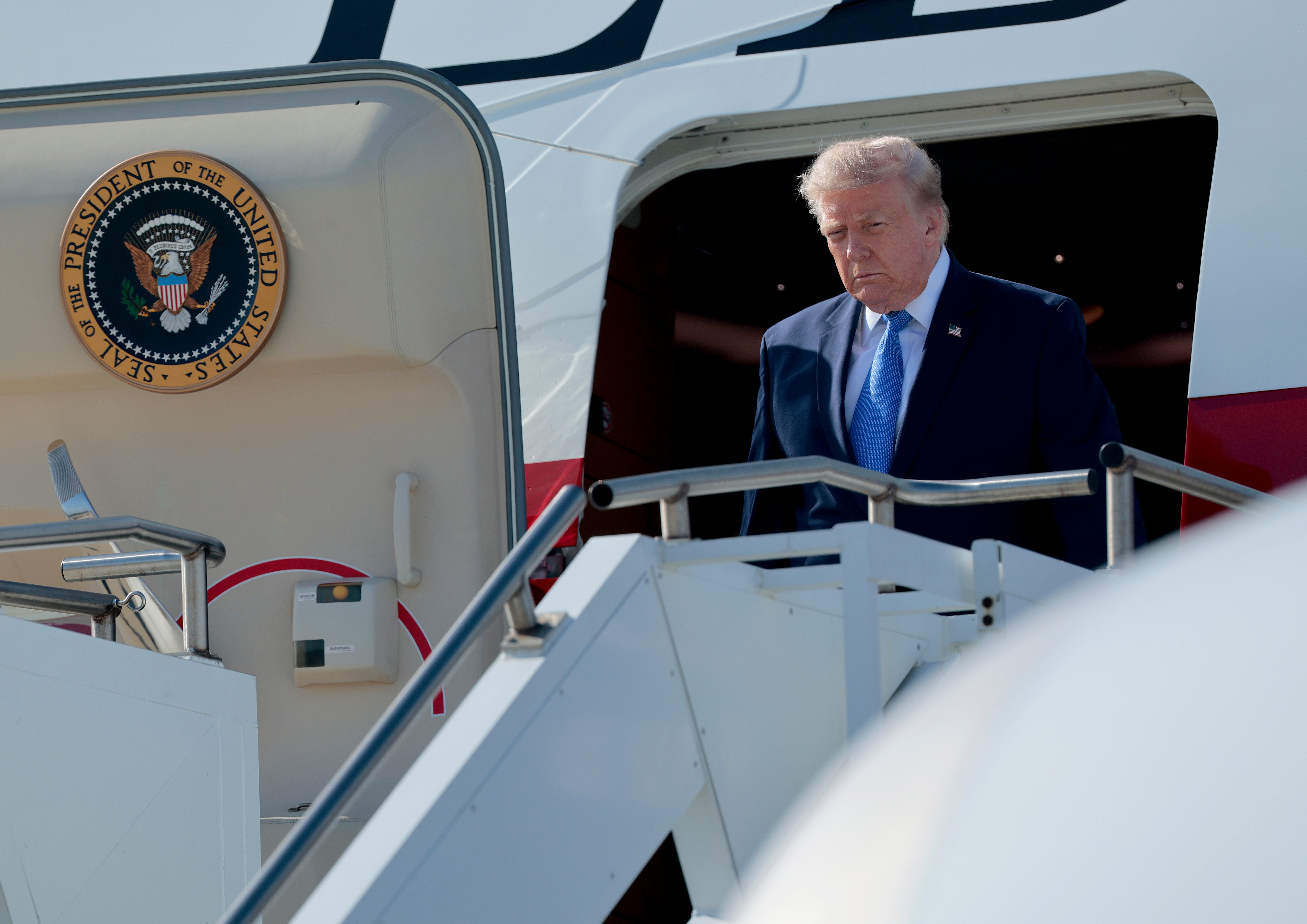 Trump is scheduled to speak Tuesday evening at a Republican National Committee fundraiser at the golf club