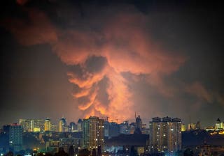 Smoke rises in the city during a Russian missile strike in Kyiv