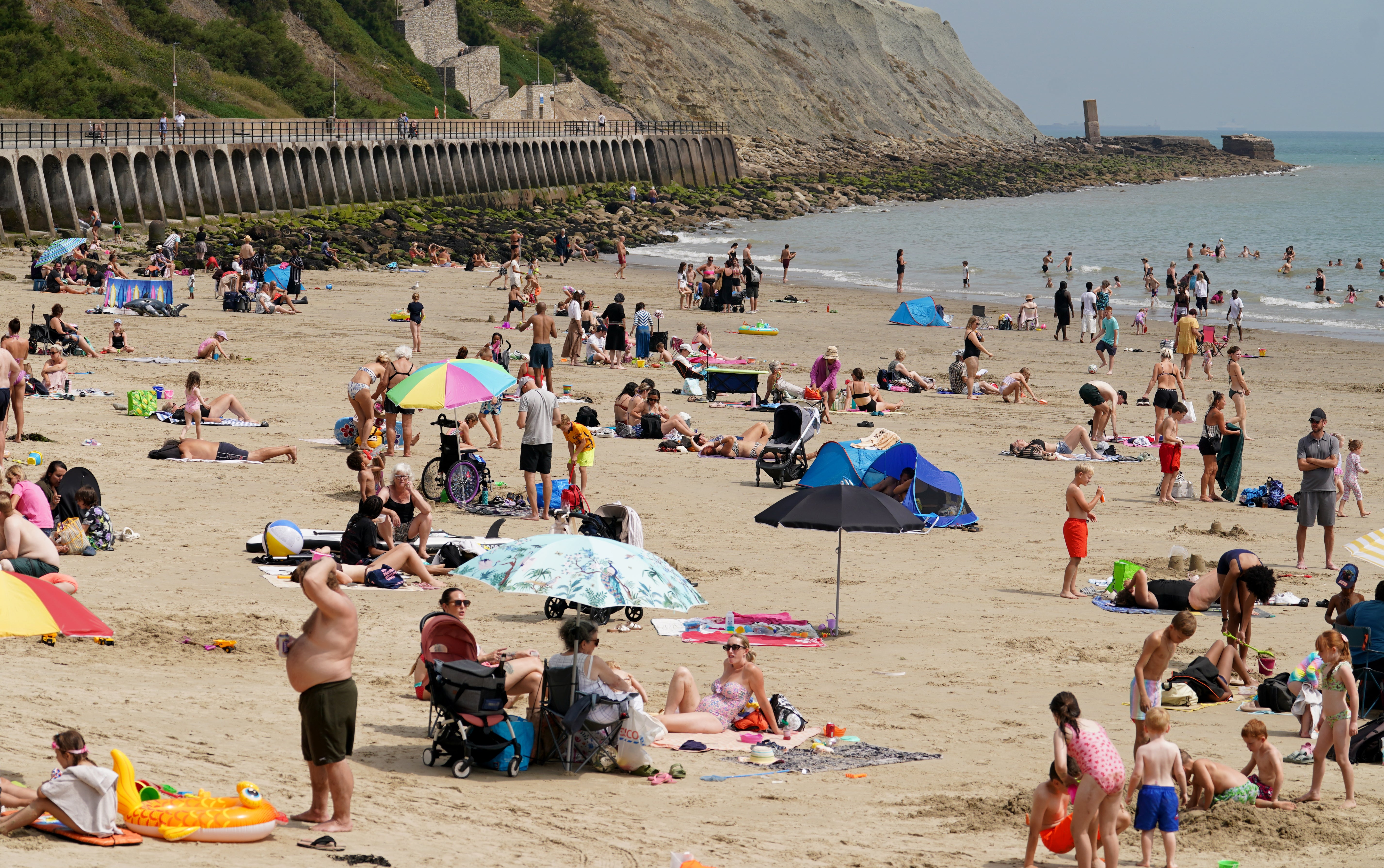 Next said the ‘over-performance’ was partly due to weather in the UK being warmer than anticipated (Gareth Fuller/PA)