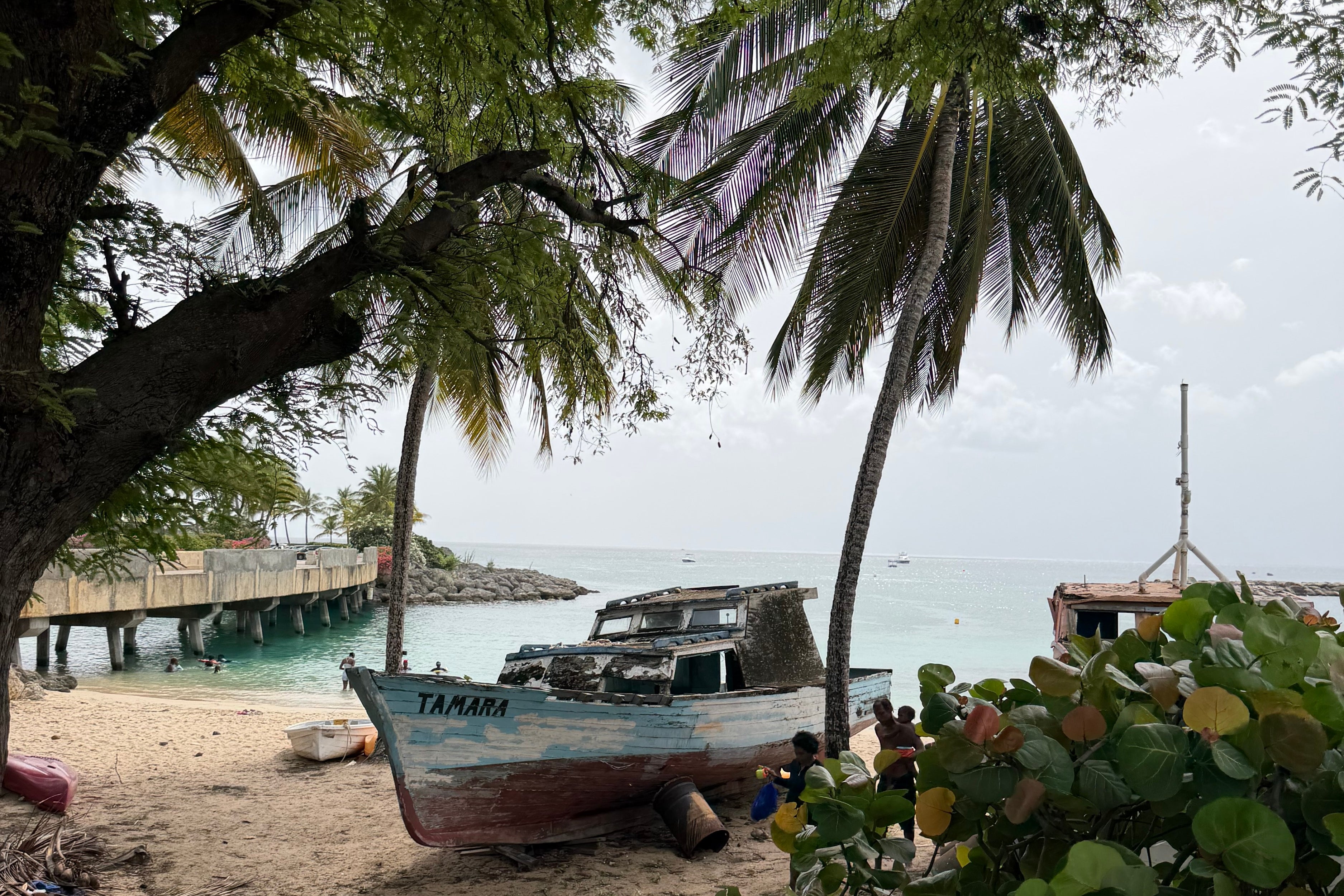 An old fishing boat near Oistins Fish Fry in the south of Barbados (Angelina Villa-Clarke)