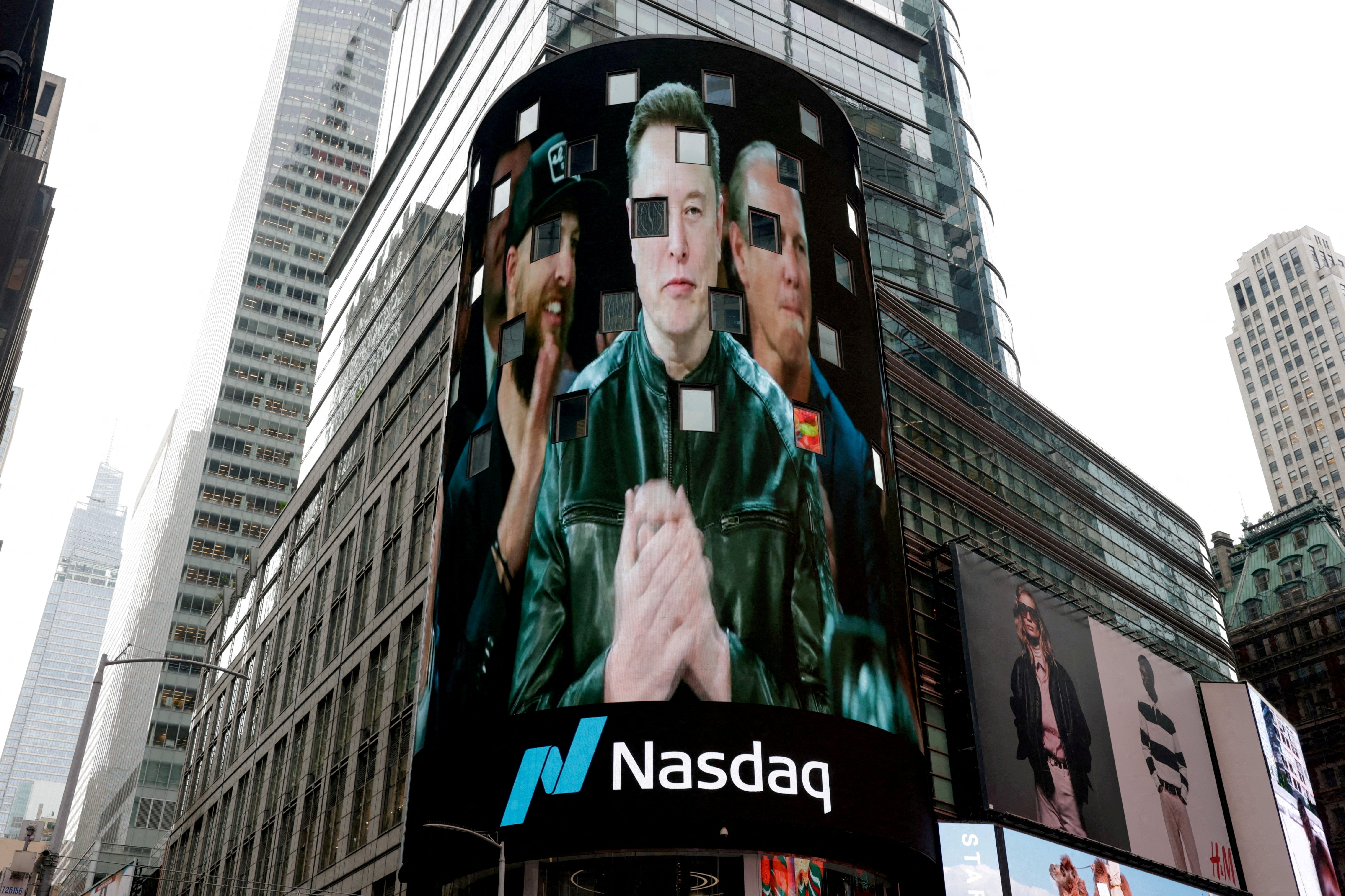 A live feed shows SpaceX CEO Elon Musk on the day of SpaceX's initial public offering (IPO) at the Nasdaq MarketSite, in New York City in June