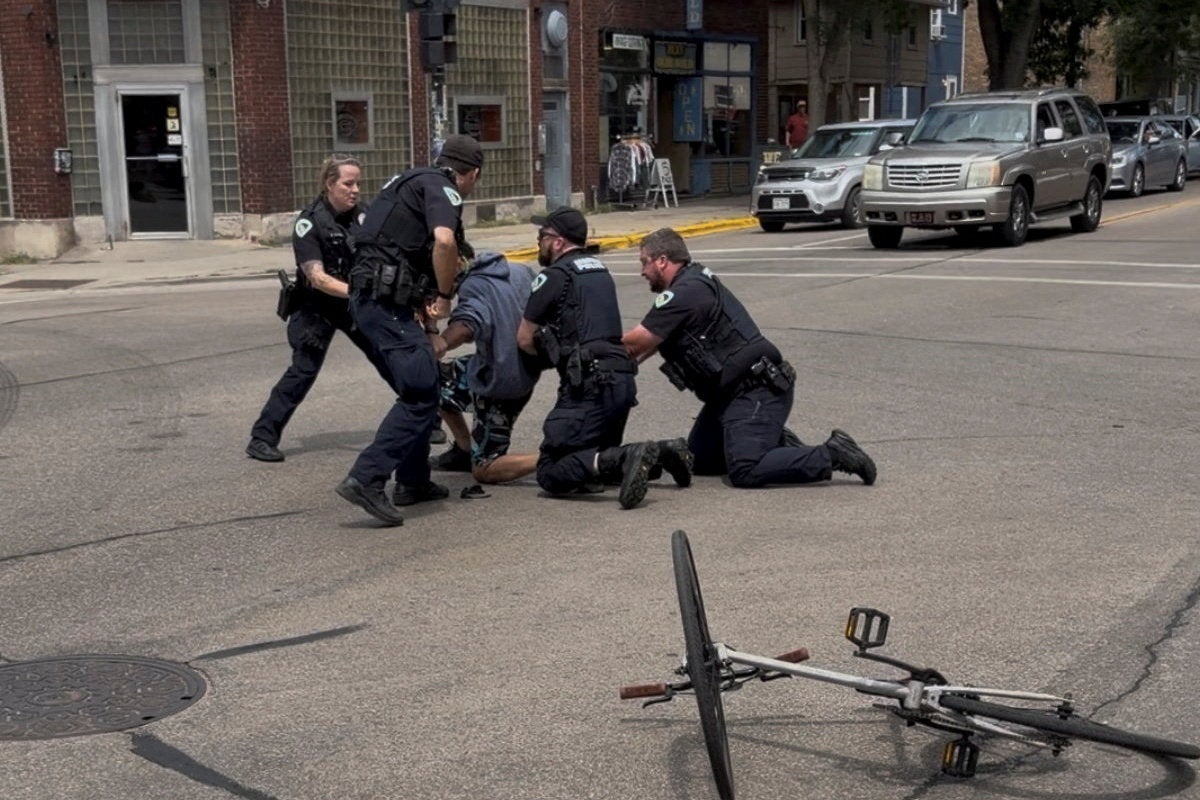 Ruiz was shot while struggling with four officers. Police say that he pulled a knife, injuring one officer who then shot him (Reuters)