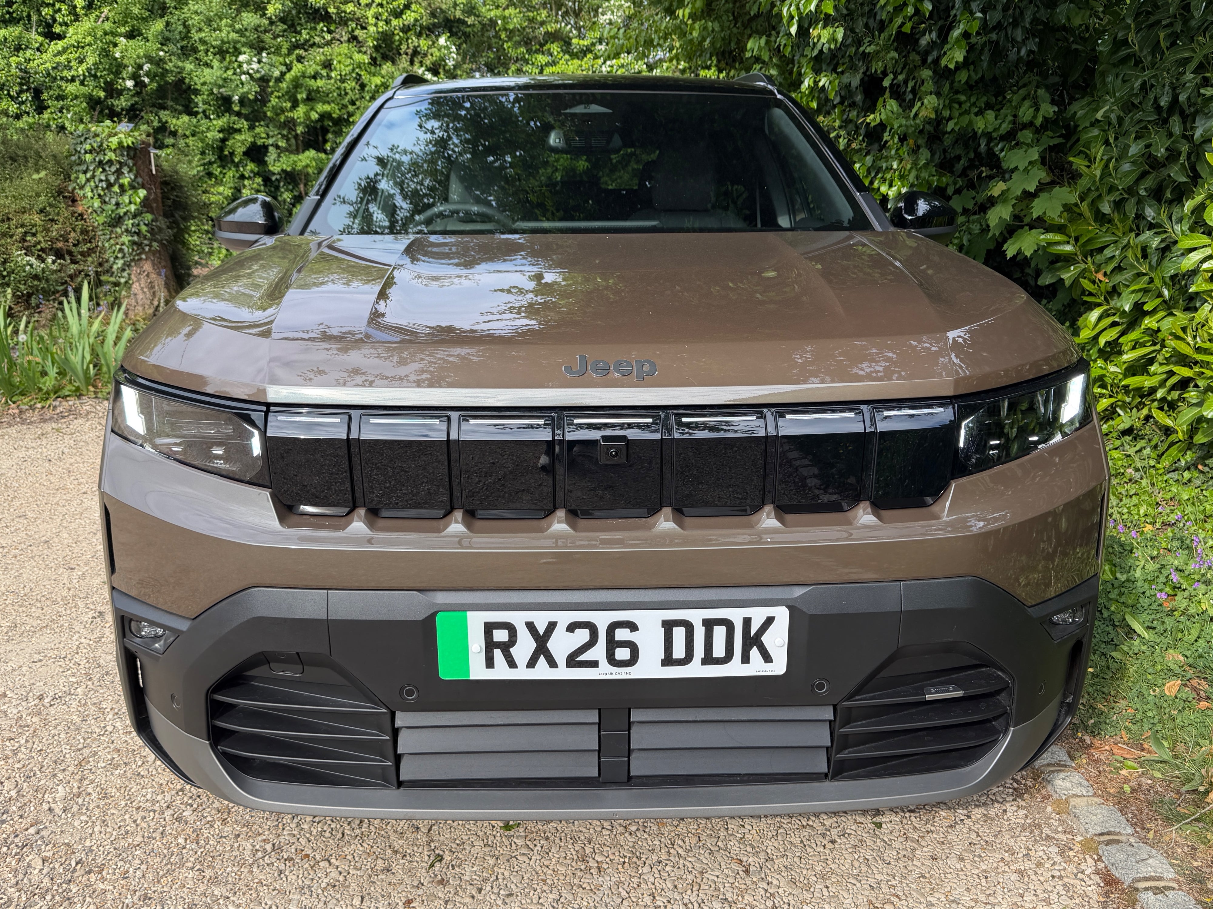 The new Jeep Compass Electric gets plenty of rugged styling cues and an updated, illuminated version of the famous Jeep seven bar grille (Steve Fowler)