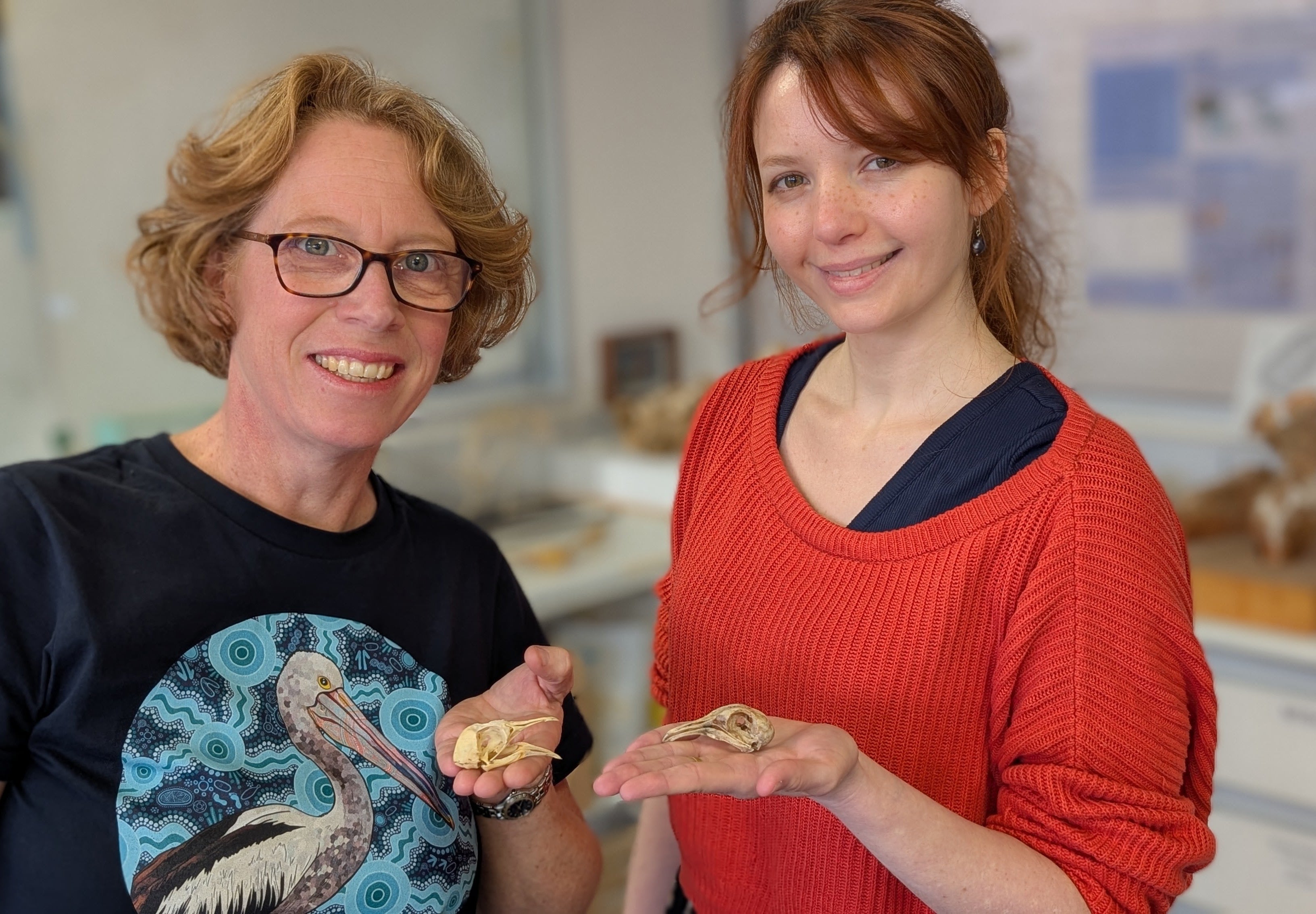 Vera Weisbecker and Aubrey Keirnan with pigeon skulls