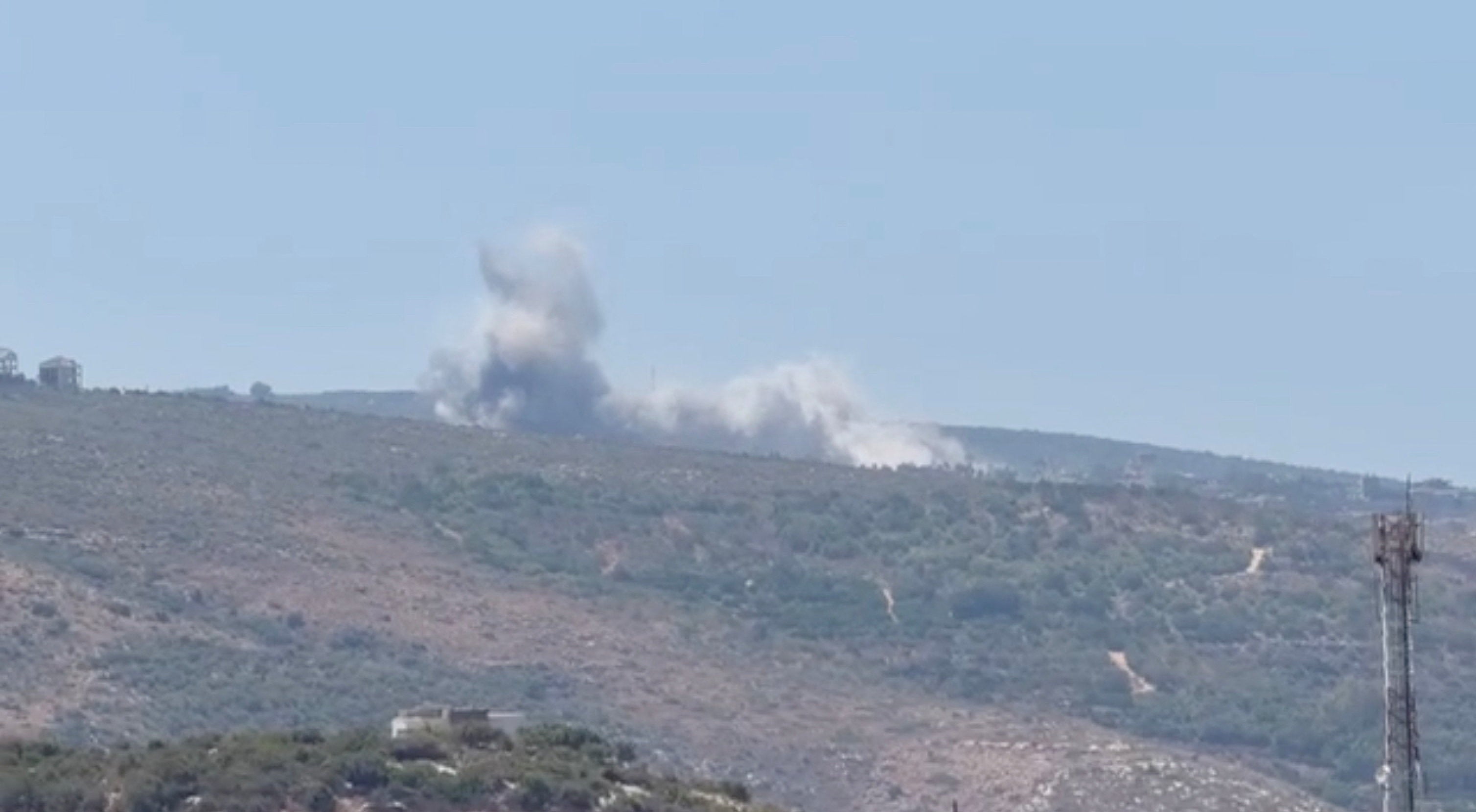 Smoke rises from a hill following Israeli air strikes, after the Israeli military issued an evacuation warning to the village of Mansouri, Lebanon (Reuters)