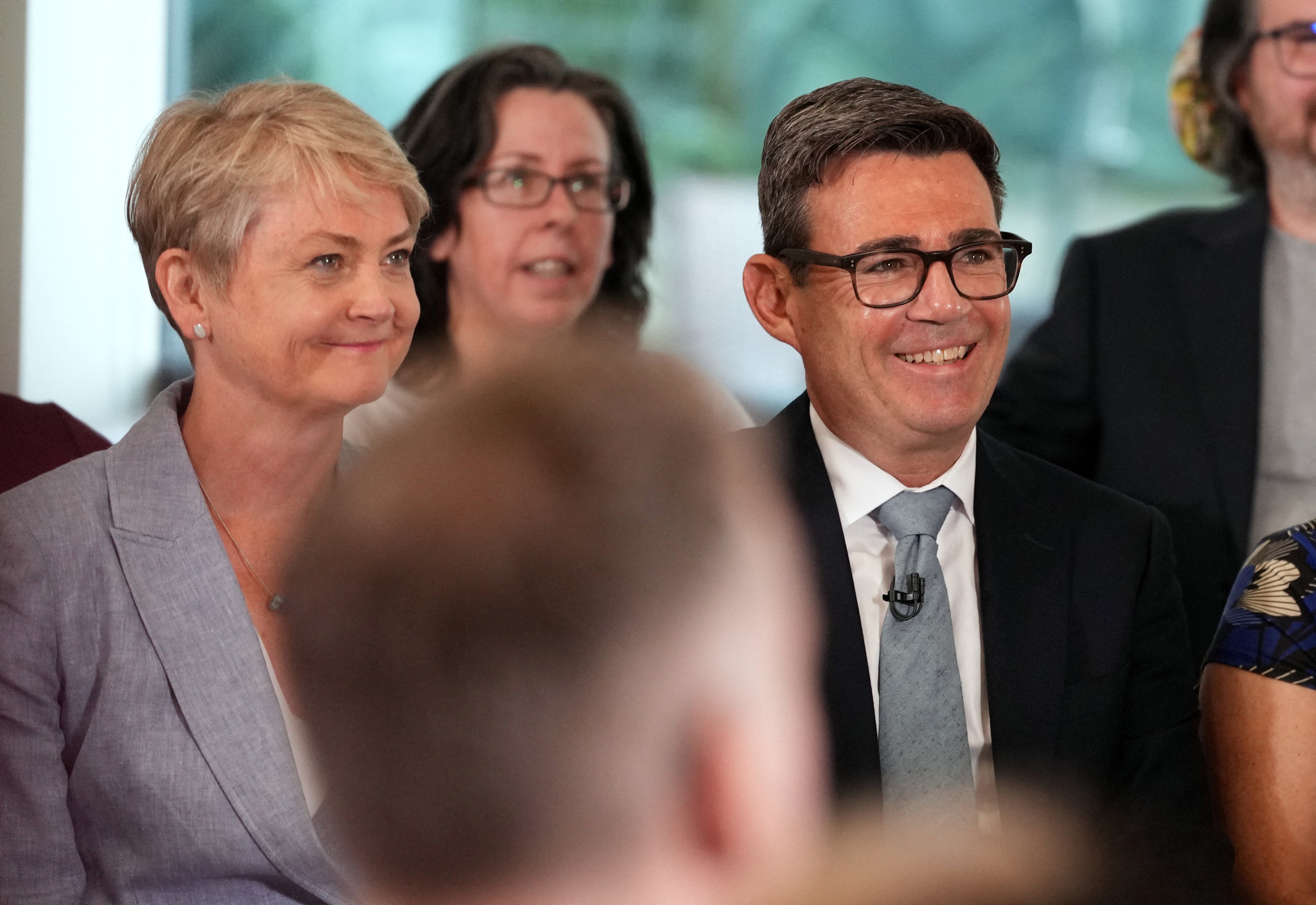 Britain's Health Secretary Yvette Cooper and Britain's Prime Minister Andy Burnham smile during a visit social care organisation Jewish Care, in north west London on July 29, 2026