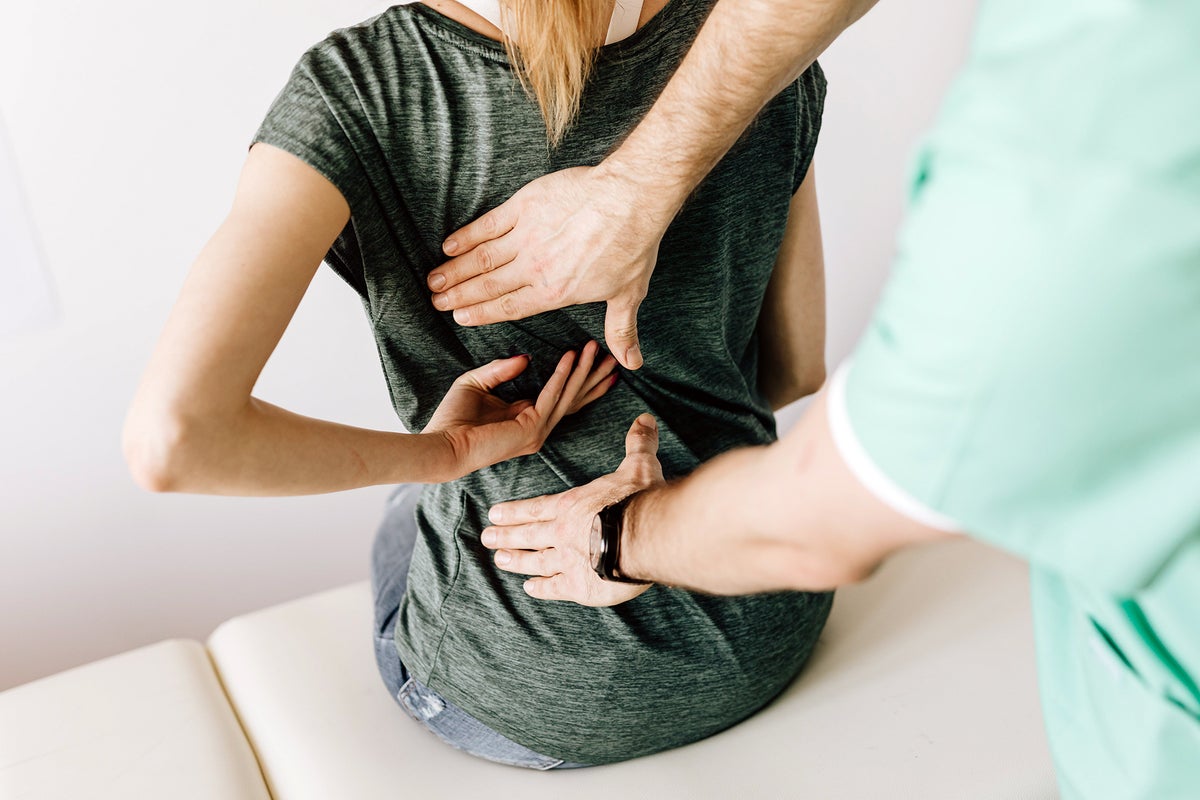 Chiropractor given warning after pulling down woman's leggings during consultation