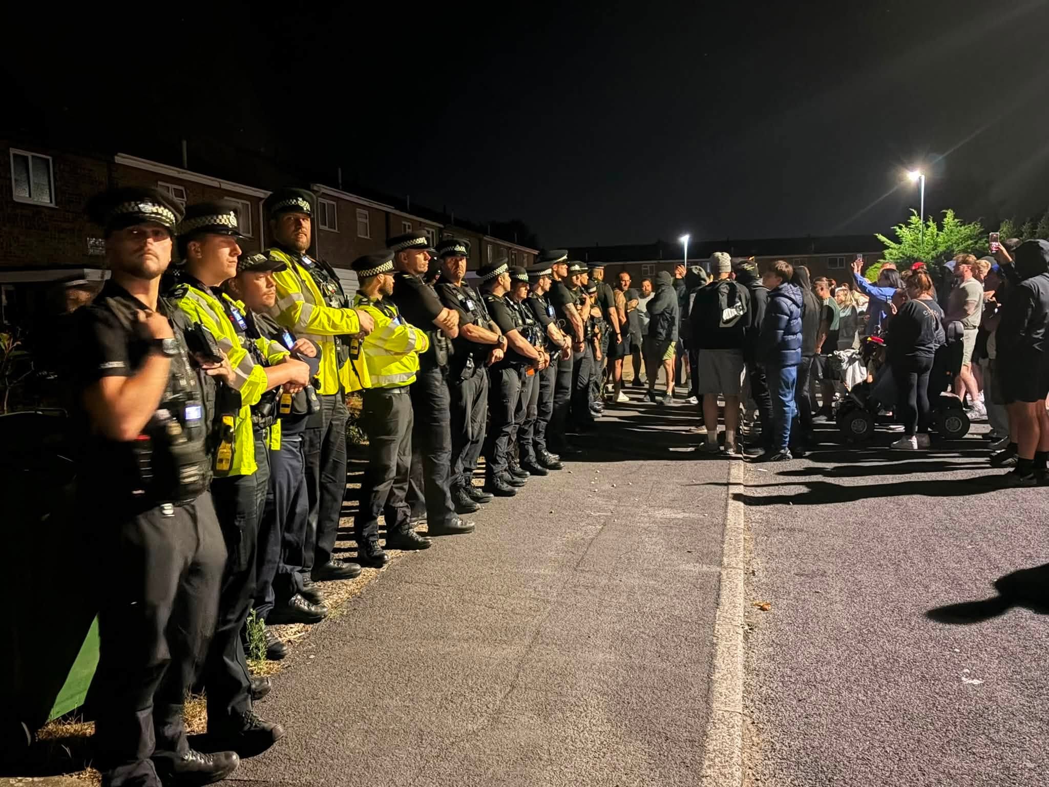 Anti-immigration protesters outside suspected asylum seeker housing in Norfolk