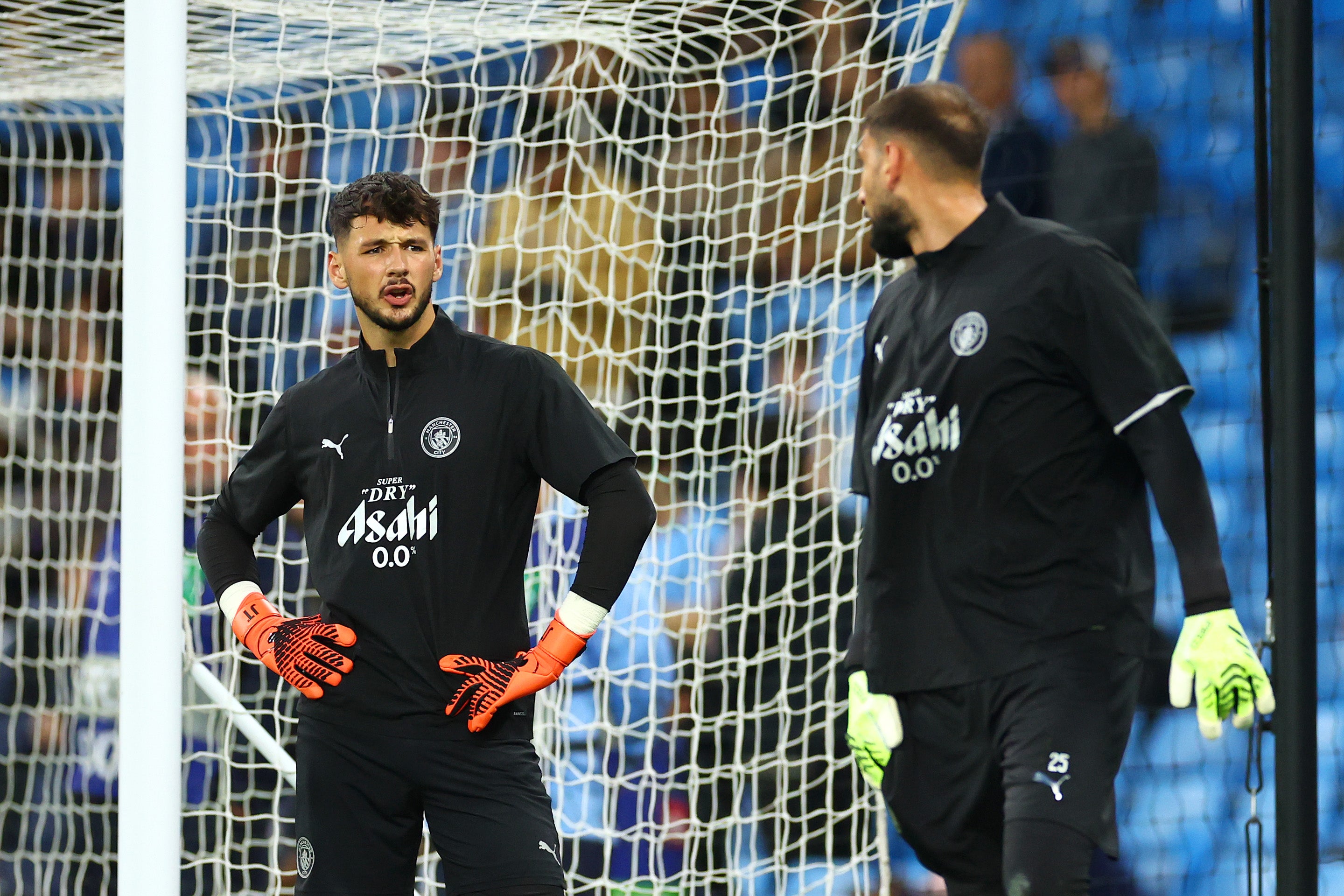The arrival of Gianluigi Donnarumma (right) at Man City relegated Trafford (left) from No 1 duty