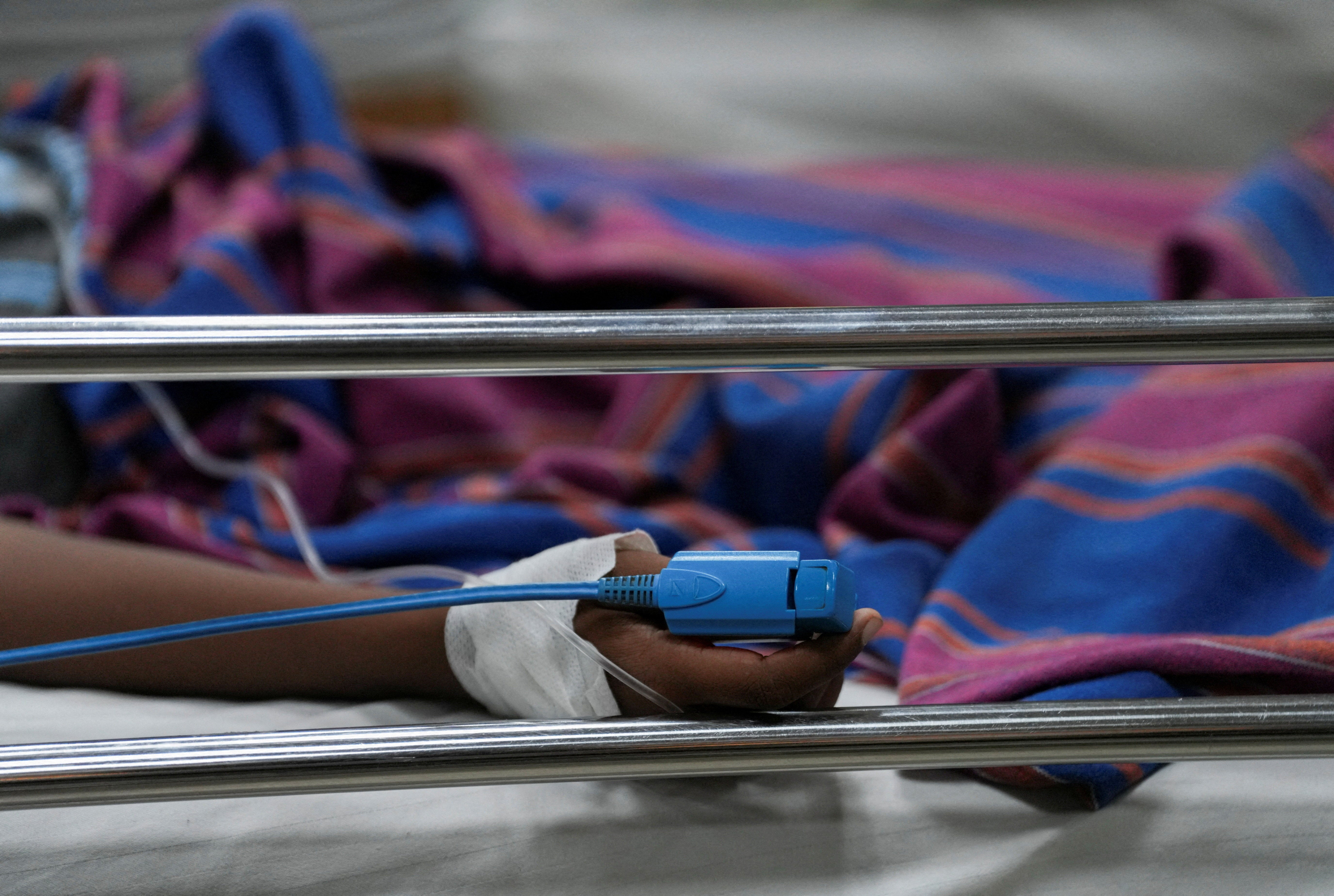 Dengue patients, such as this patient in Sri Lanka, in may develop symptoms such as vomiting, aches and pains and a rash. Symptoms typically clear up after a week, but more severe cases could require hospitalization