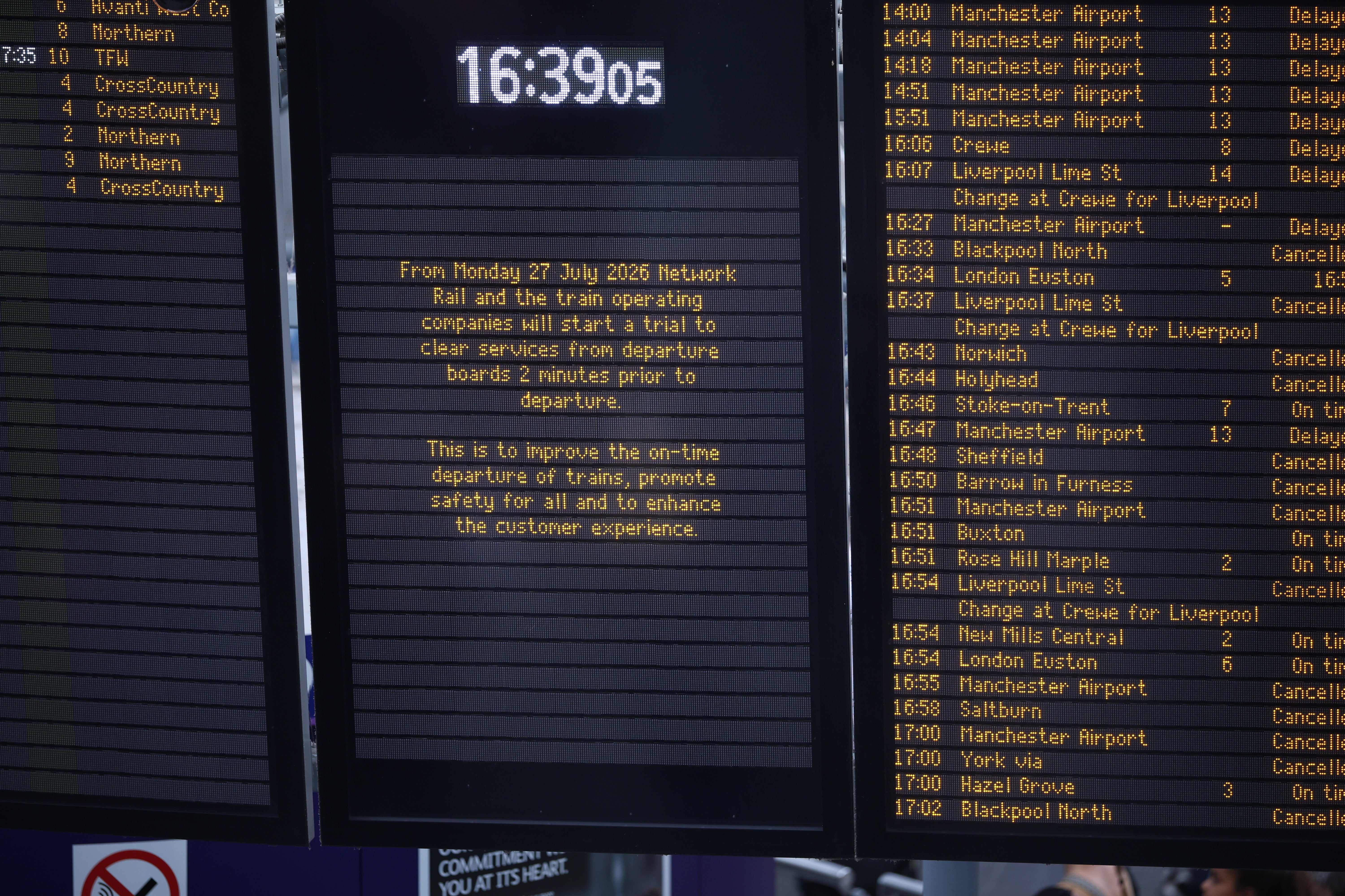 Information about cancellations displayed on a screen inside Manchester Piccadilly train station
