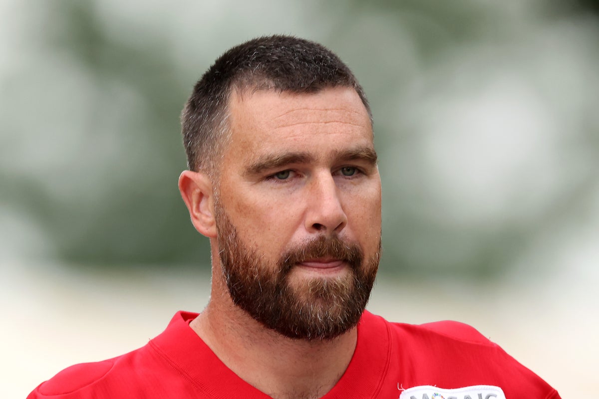 Travis Kelce’s coach defends ‘dad body’ claims after wedding to Taylor Swift