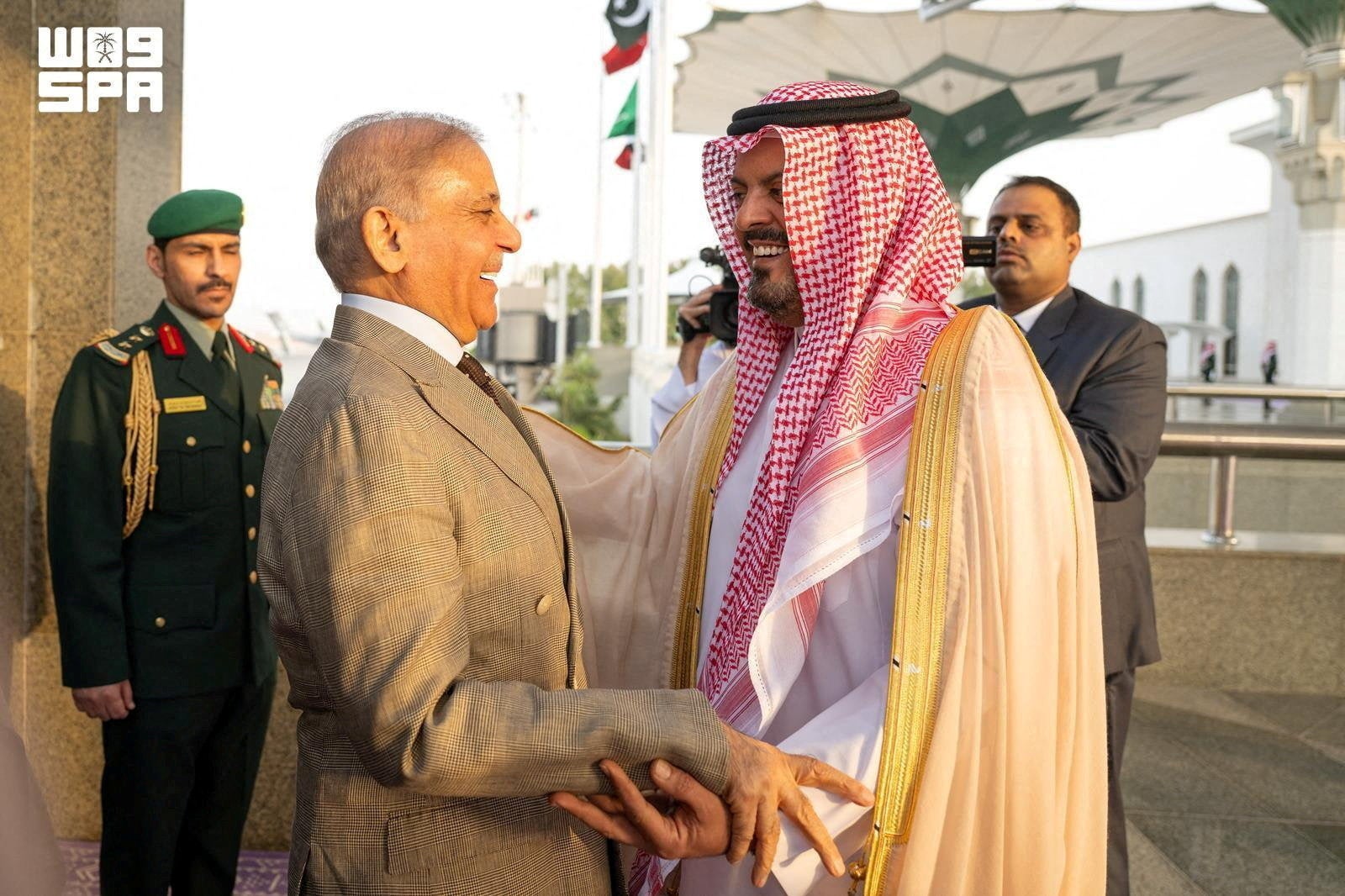 Pakistan's Prime Minister Shehbaz Sharif is received by Deputy Governor of Mecca region, Prince Saud bin Mishaal bin Abdulaziz upon his arrival in Jeddah