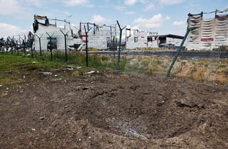 File. A crater near the remains of the Wildberries warehouse that burned down after a recent Ukrainian drone attack in the course of the Russia-Ukraine conflict, in the city of Elektrostal in the Moscow region, Russia, 23 July 2026