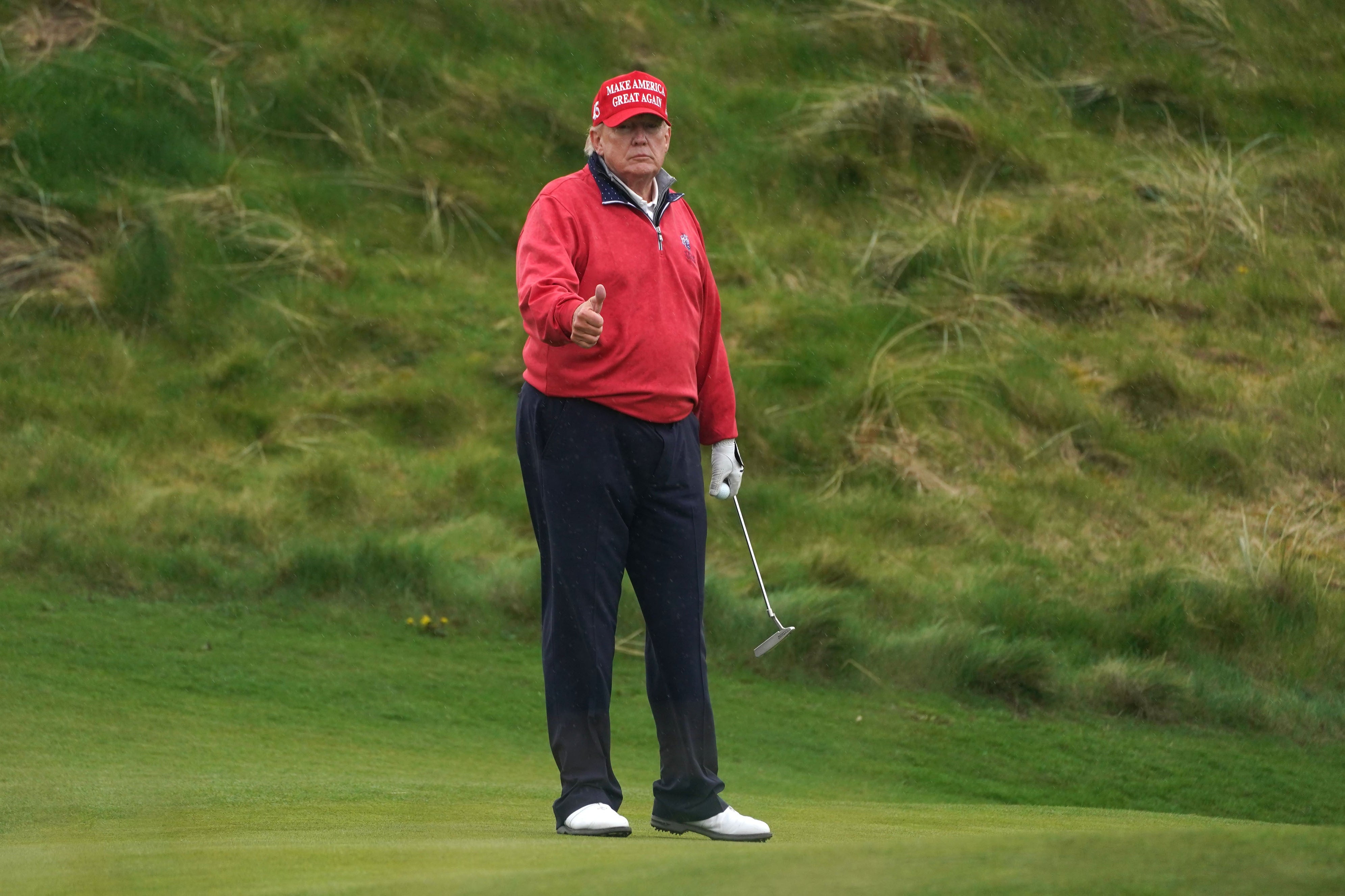 Donald Trump is a keen golfer, something connected to his love of grass (PA Archive)