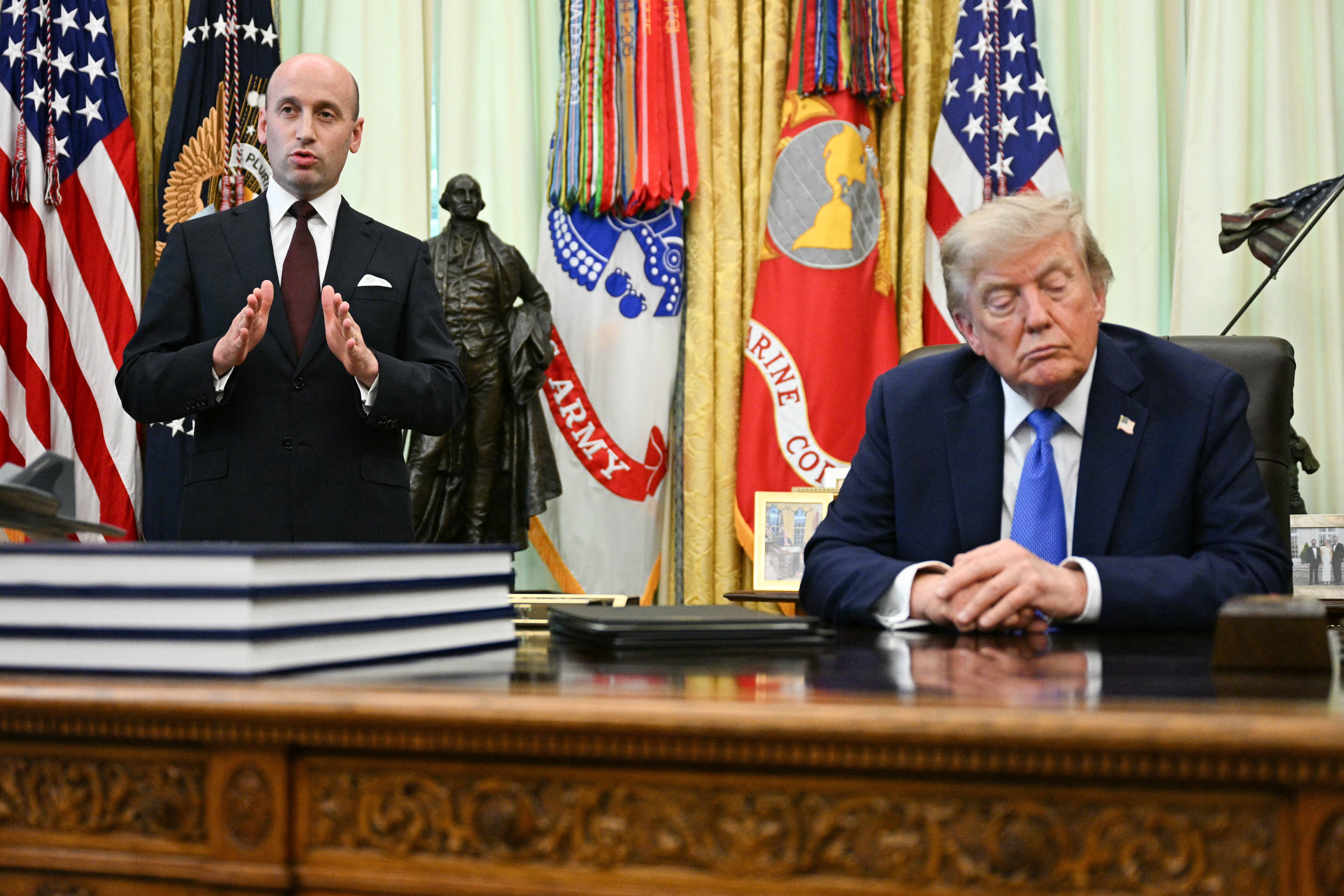 President Donald Trump looks on as White House Deputy Chief of Staff Stephen Miller speaks on new executive orders about birthright citizenship - despite a Supreme Court ruling