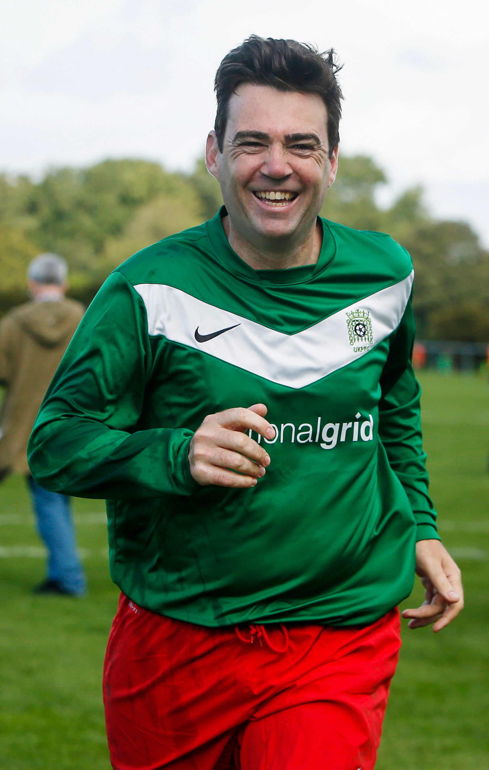 Andy Burnham, pictured during a football match between Labour Party members and journalists in 2016, is an Everton fan