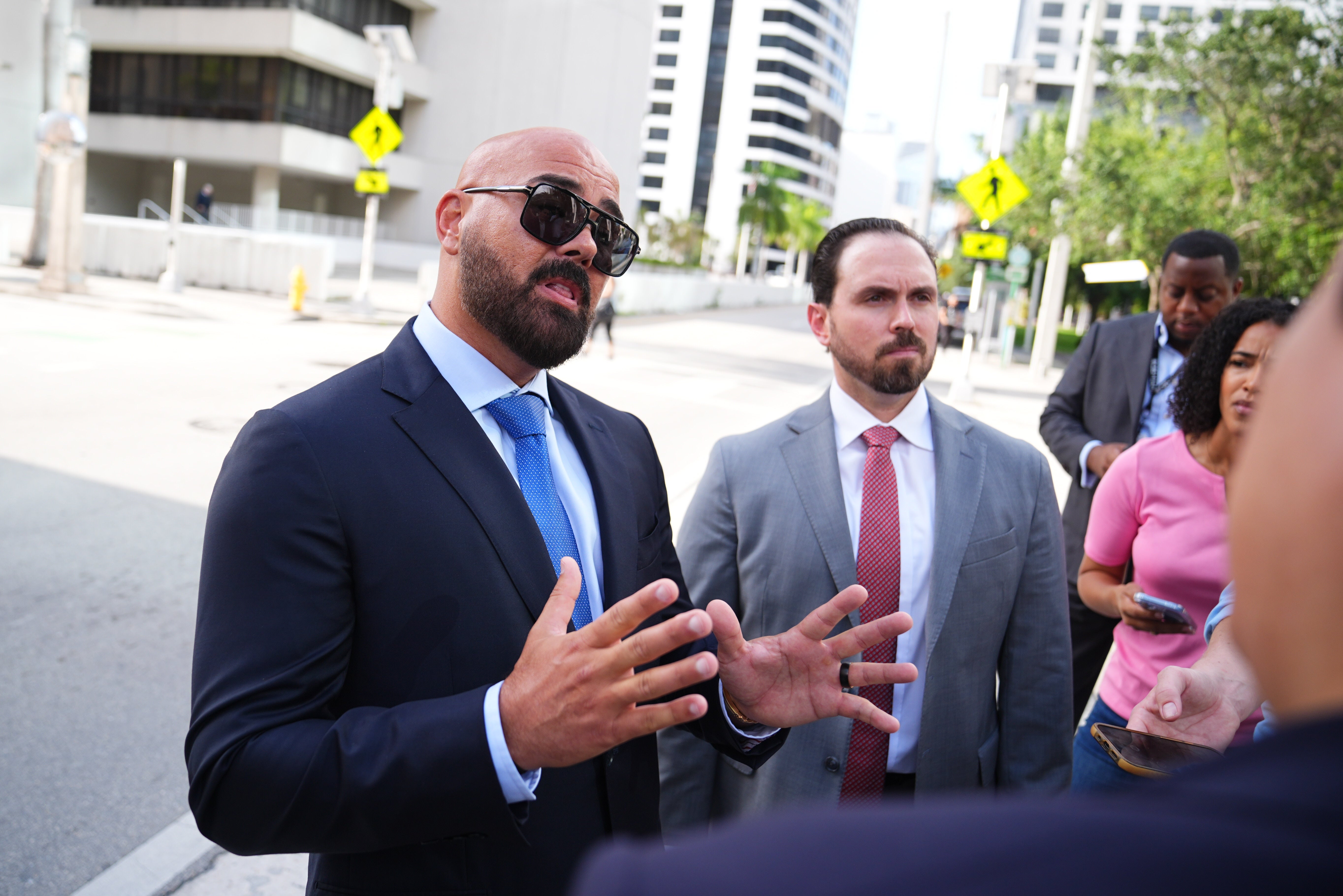 Joe McBride (left) and Thomas Maniotis, the lawyers for Andrew and Tristan Tate (PA Wire)