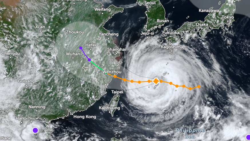 Typhoon Dolphin over Japan's southern islands on Friday, with its forecast track running west towards China. The orange dots mark the storm's path and forecast positions while it holds typhoon strength, turning green as it is expected to weaken to a tropical storm after landfall between Zhejiang and Fujian, and purple as it decays further inland over eastern China. The shaded area shows the range of possible tracks. (Zoom Earth)