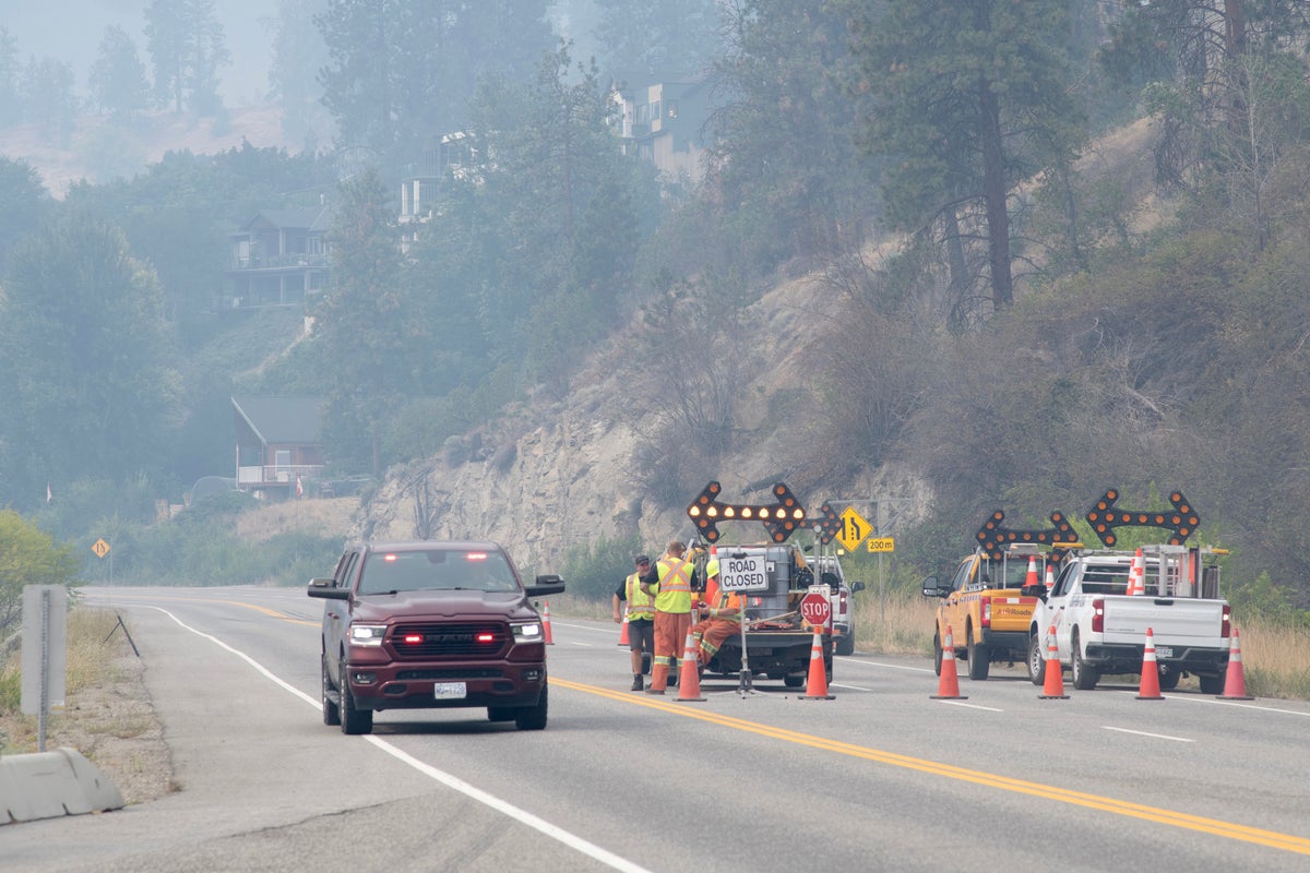 Fast-moving wildfire in western Canada forces 20,000 to flee their homes
