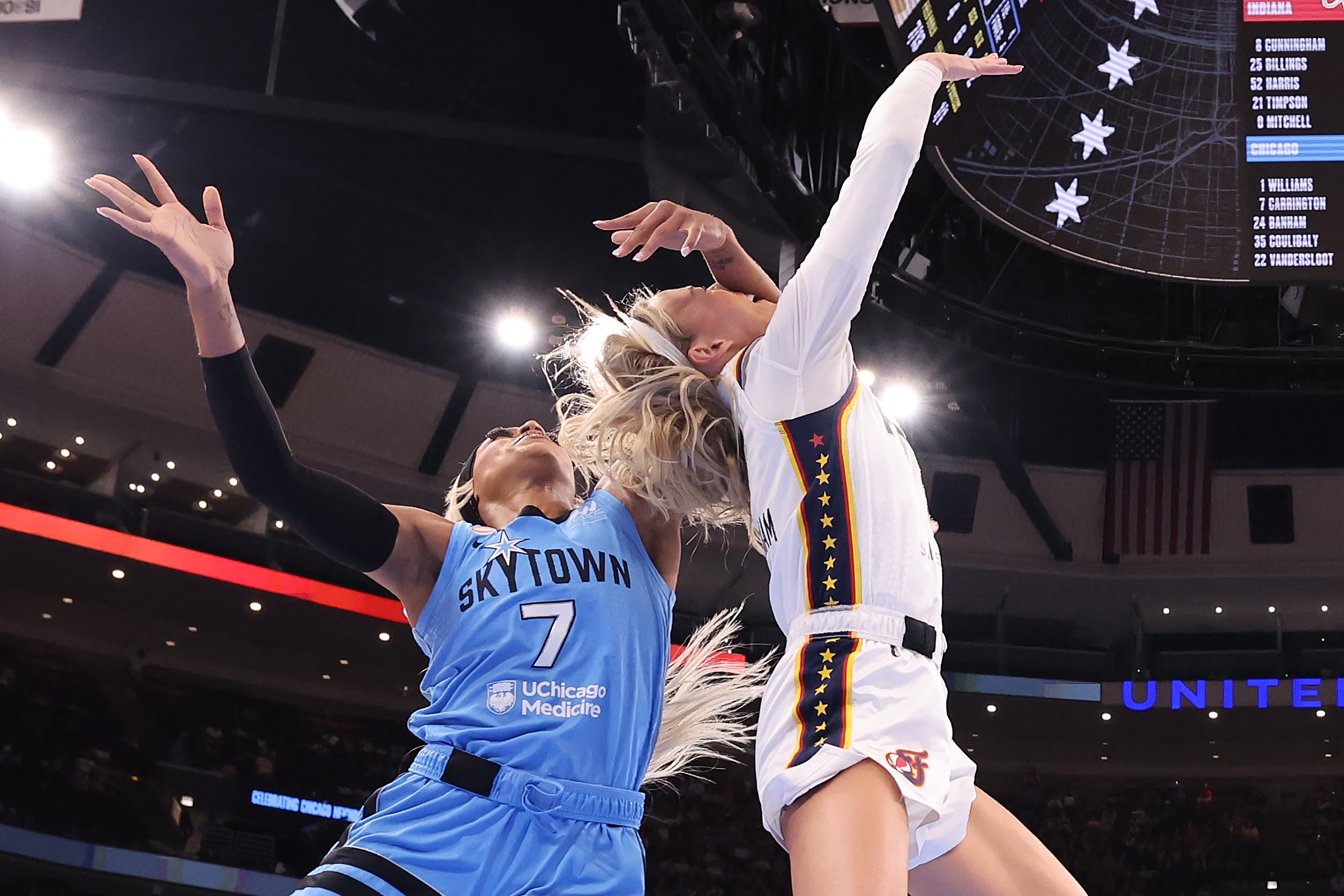 Sophie Cunningham (right) is fouled by DiJonai Carrington