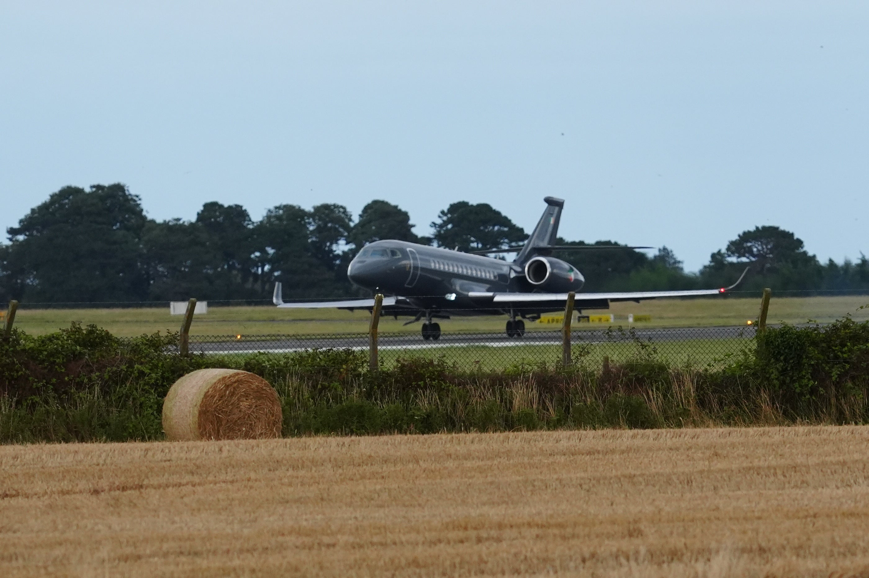 An Irish government plane carrying Daniel Kinahan landing at Casement Aerodrome, Baldonnell, on Sunday (PA)