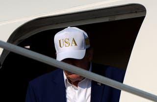 US president Donald Trump disembarks Air Force One at Joint Base Andrews, Maryland, US, 9 August 2026