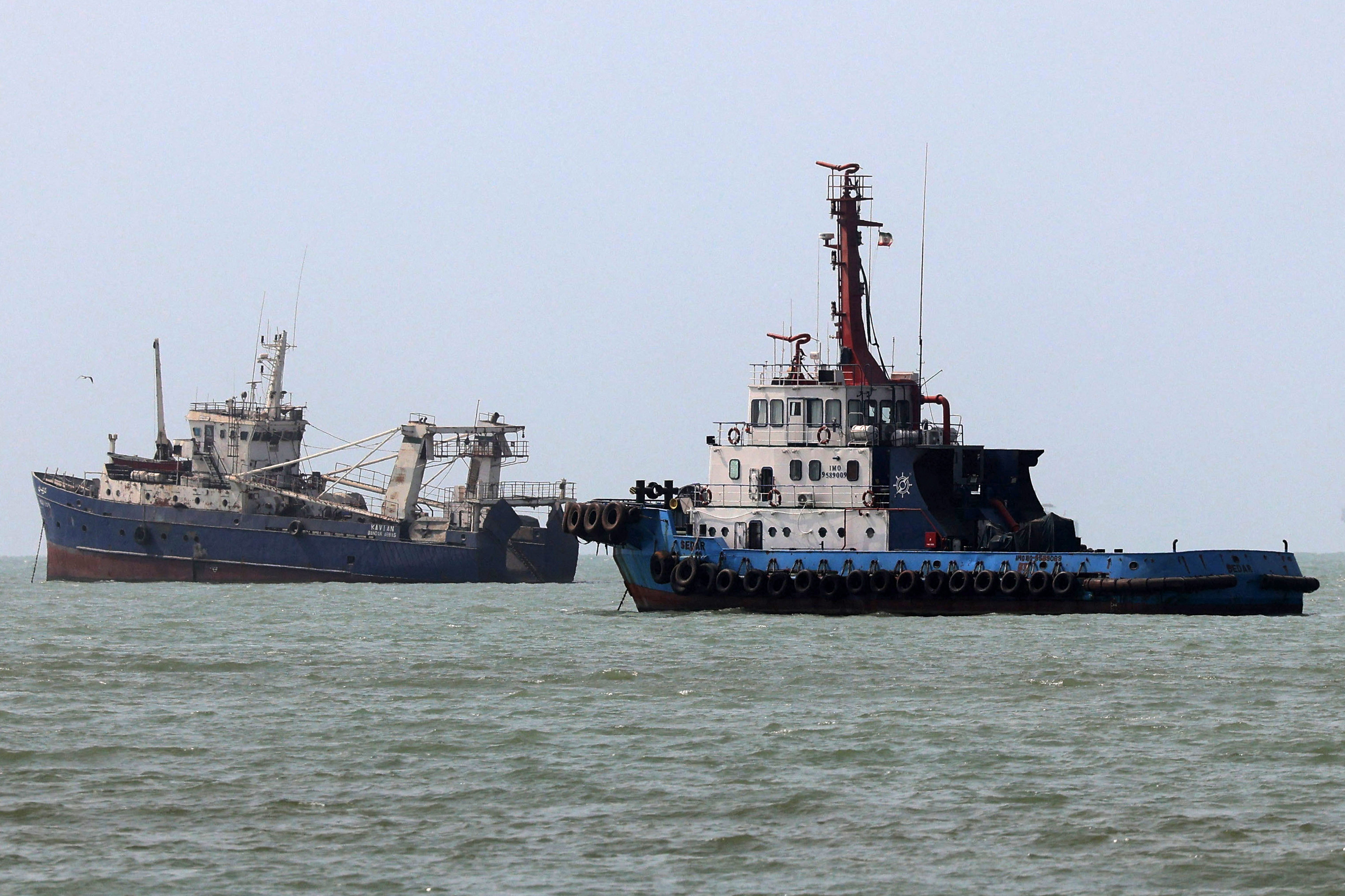 Vessels transit the Strait of Hormuz off Bandar Abbas in southern Iran on August 10 (AFP/Getty)
