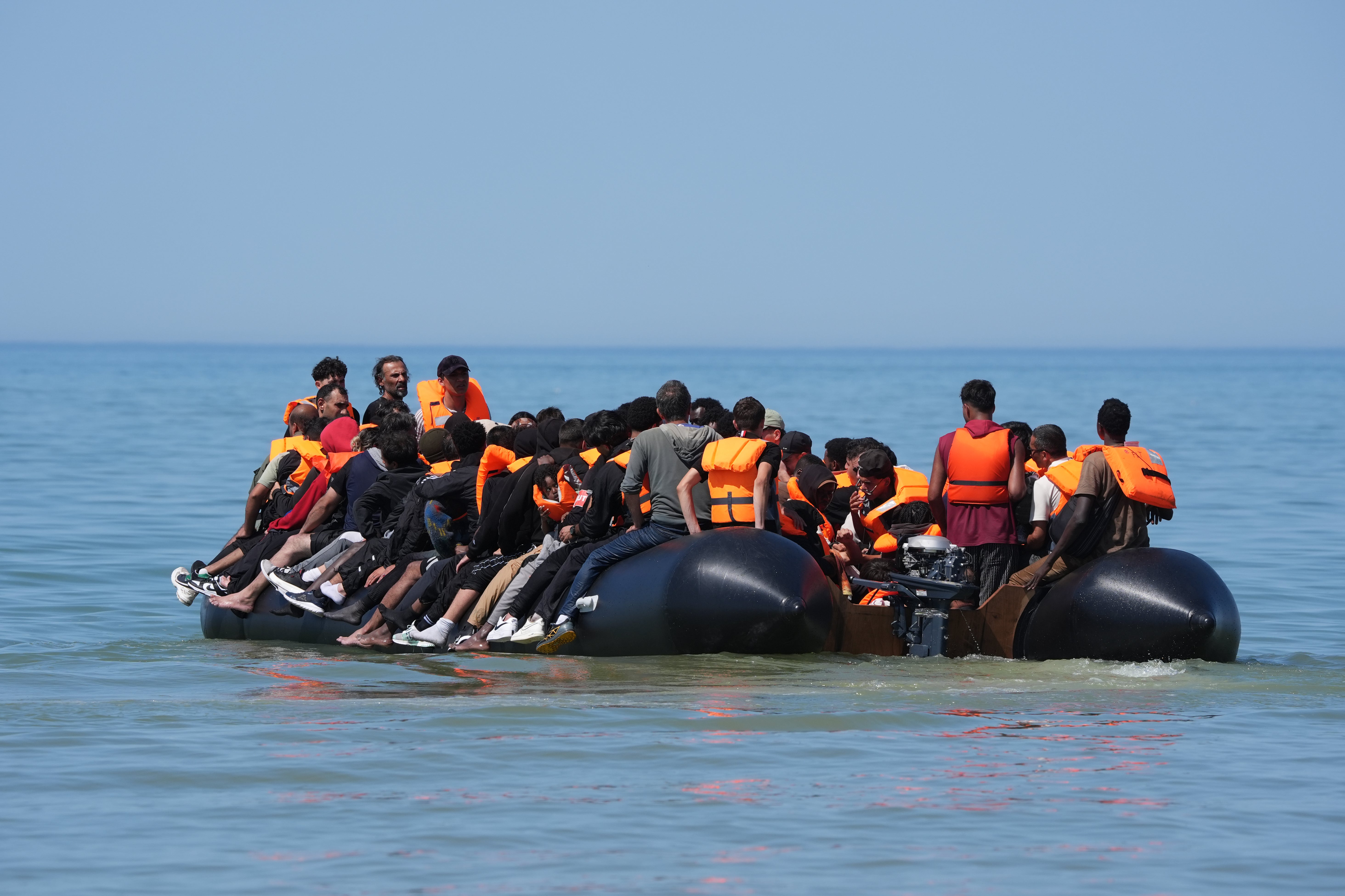 People thought to be migrants on board a small boat off the coast of Hardelot, France last month (PA) (PA Wire)