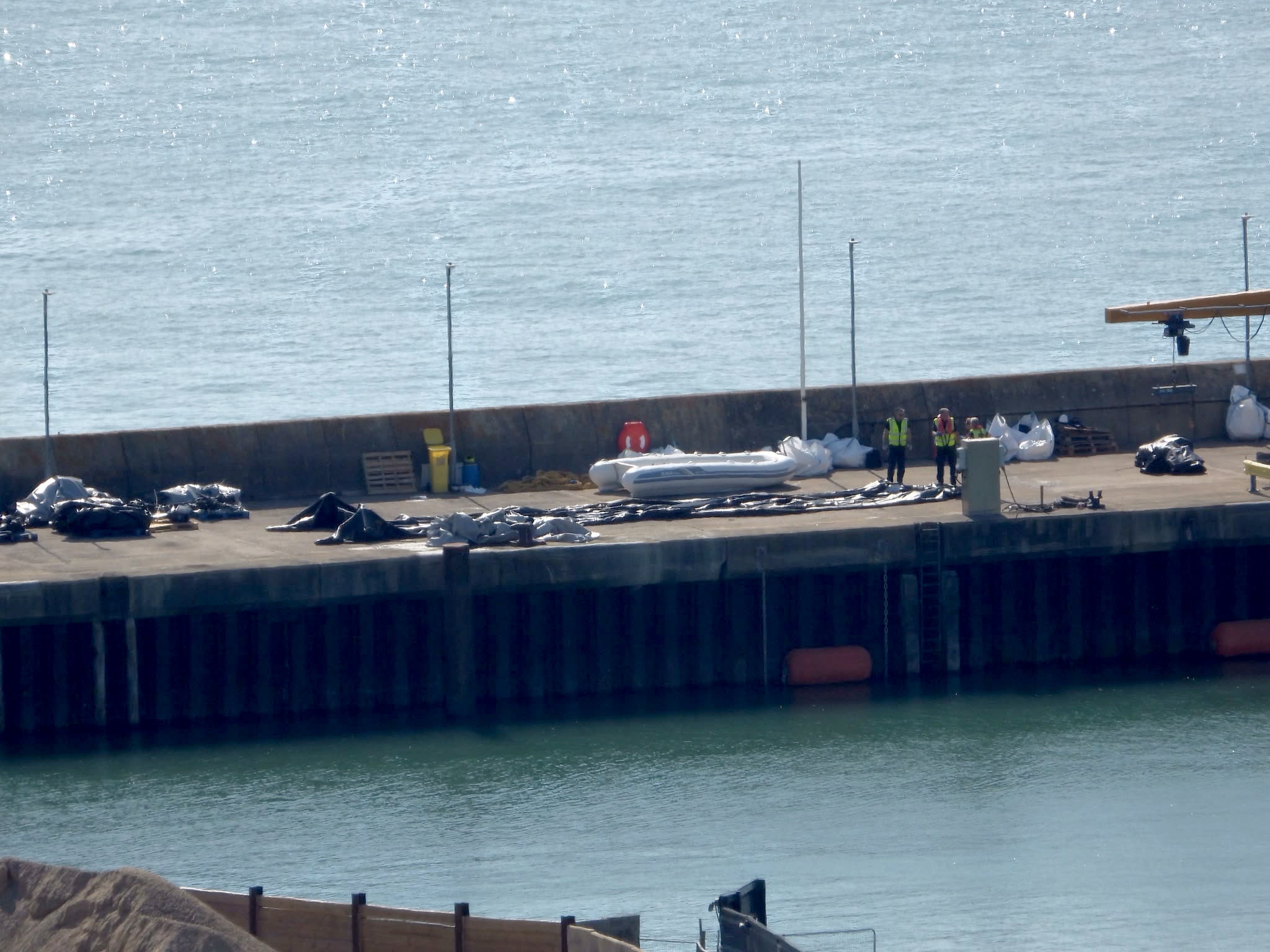 A deflated dinghy is seen on the quayside in Dover, Kent on Monday 10 August. (PA Wire)