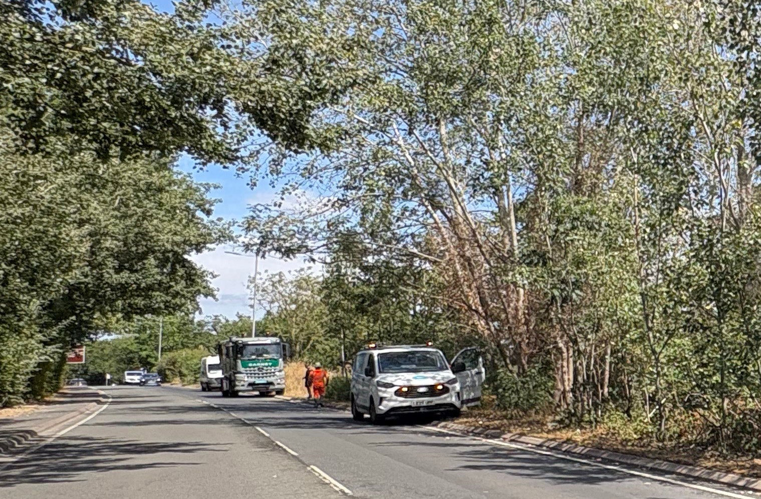 Workman on Leatherhead Road, in, Chessington, Surrey, work to fix a burst pipe (PA)