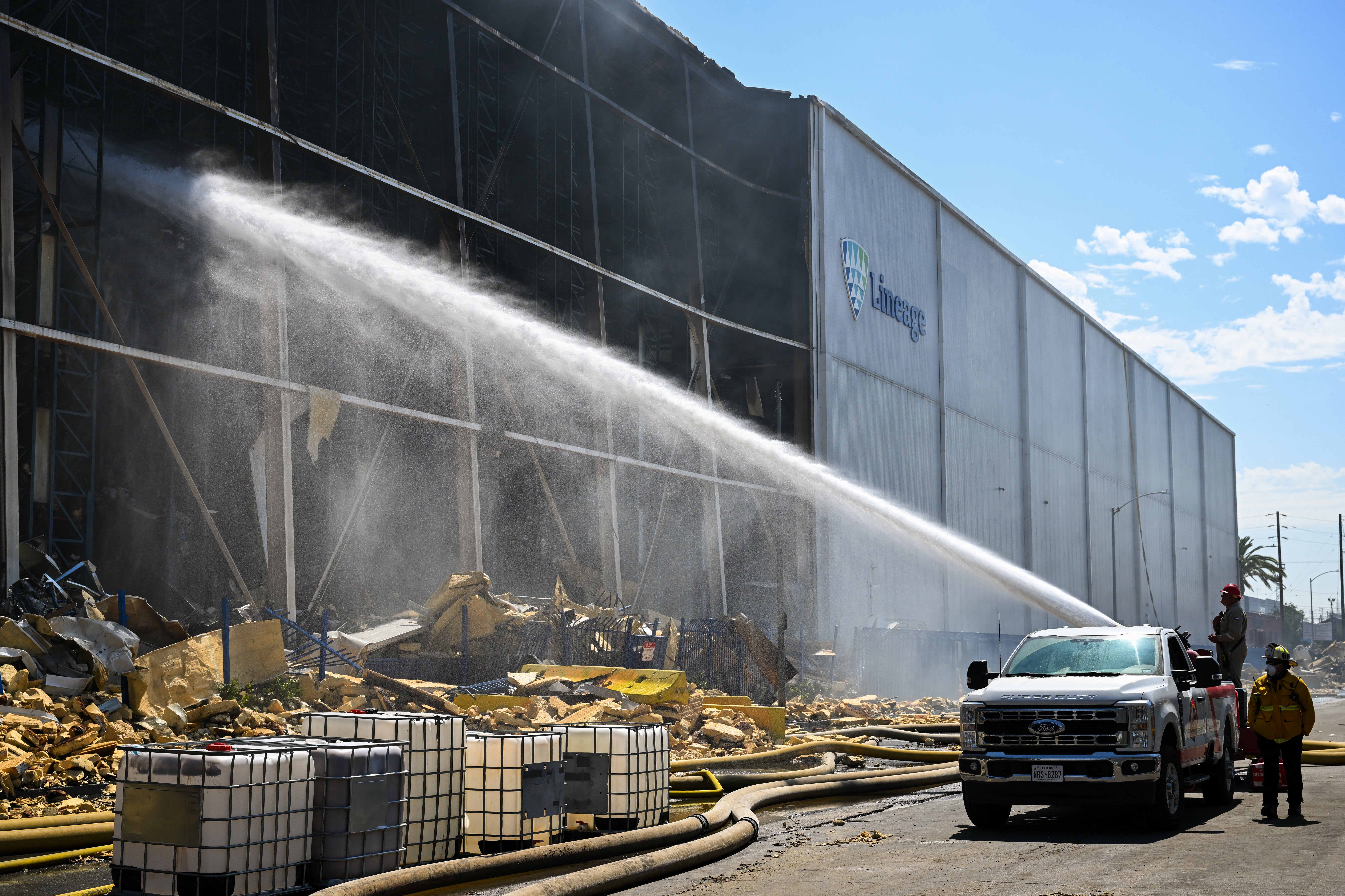 The warehouse caught fire on June 17 and burned for around a week