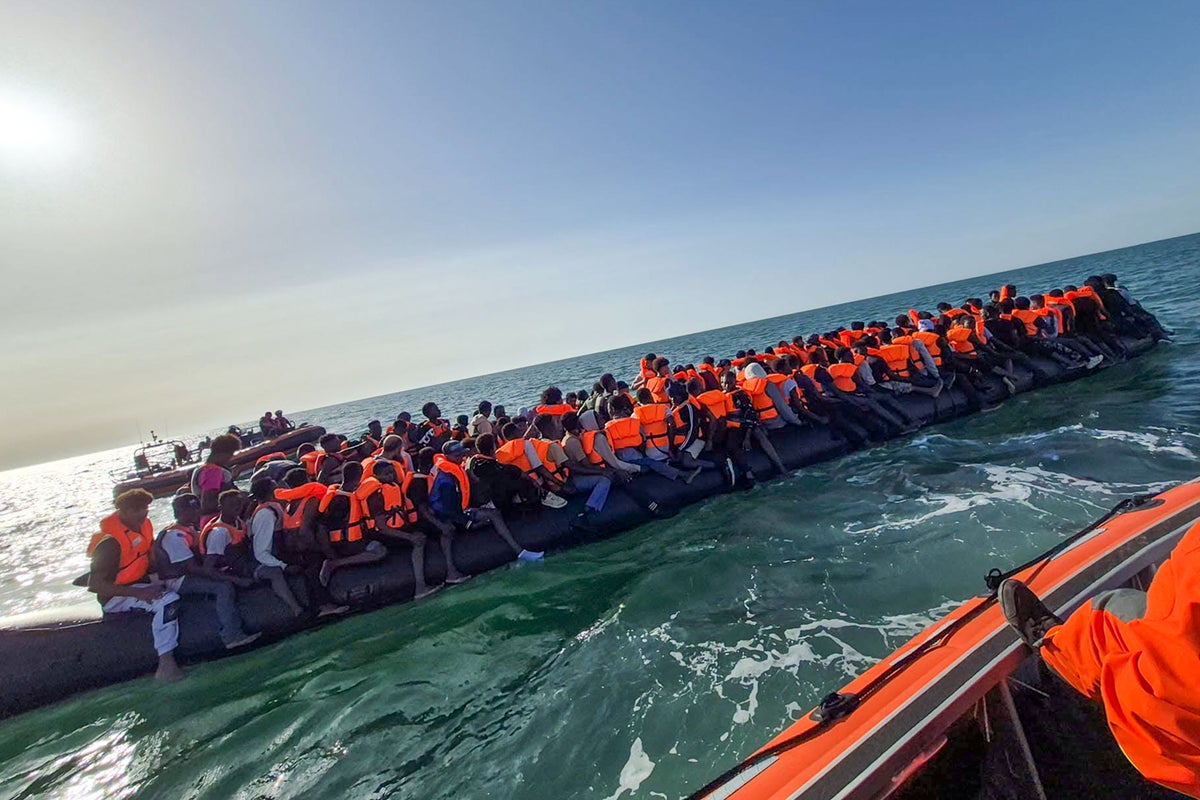 Record 230 migrants cross Channel in single ‘mega-dinghy’