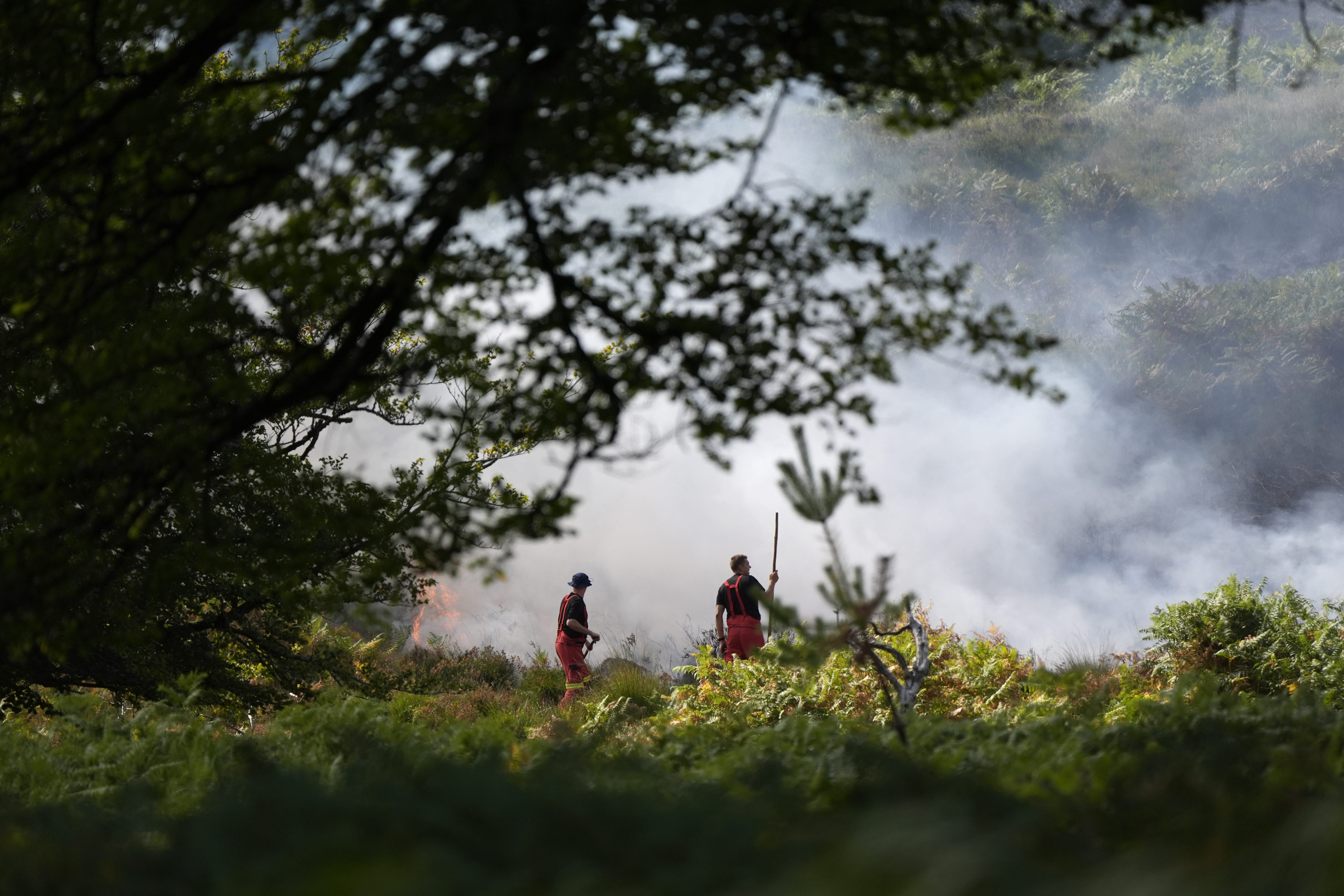 Firefighters tackle the fire at a major heathland blaze in the New Forest (Andrew Matthews/PA)