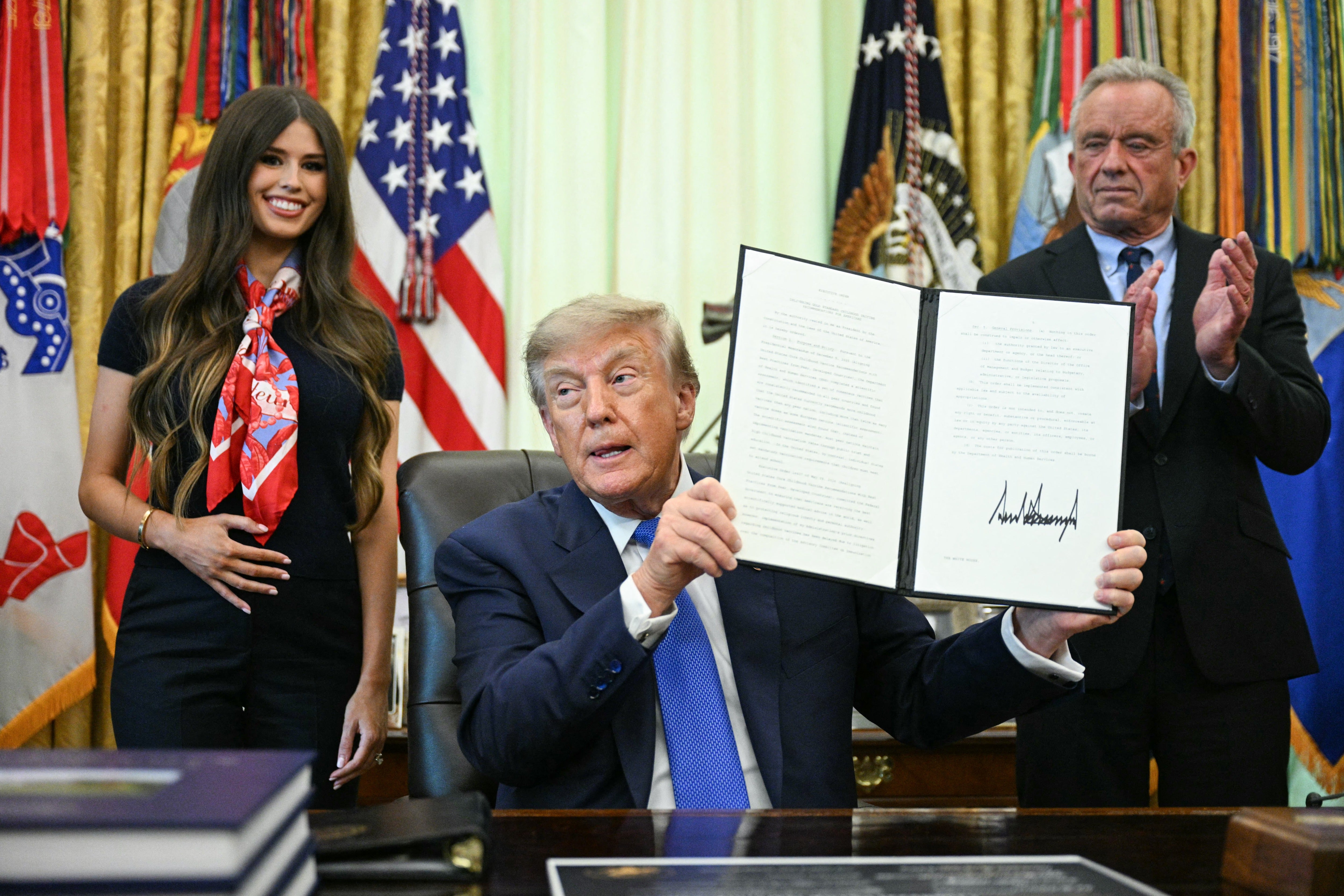 Trump signs an executive order calling for more research and flexibility on vaccines