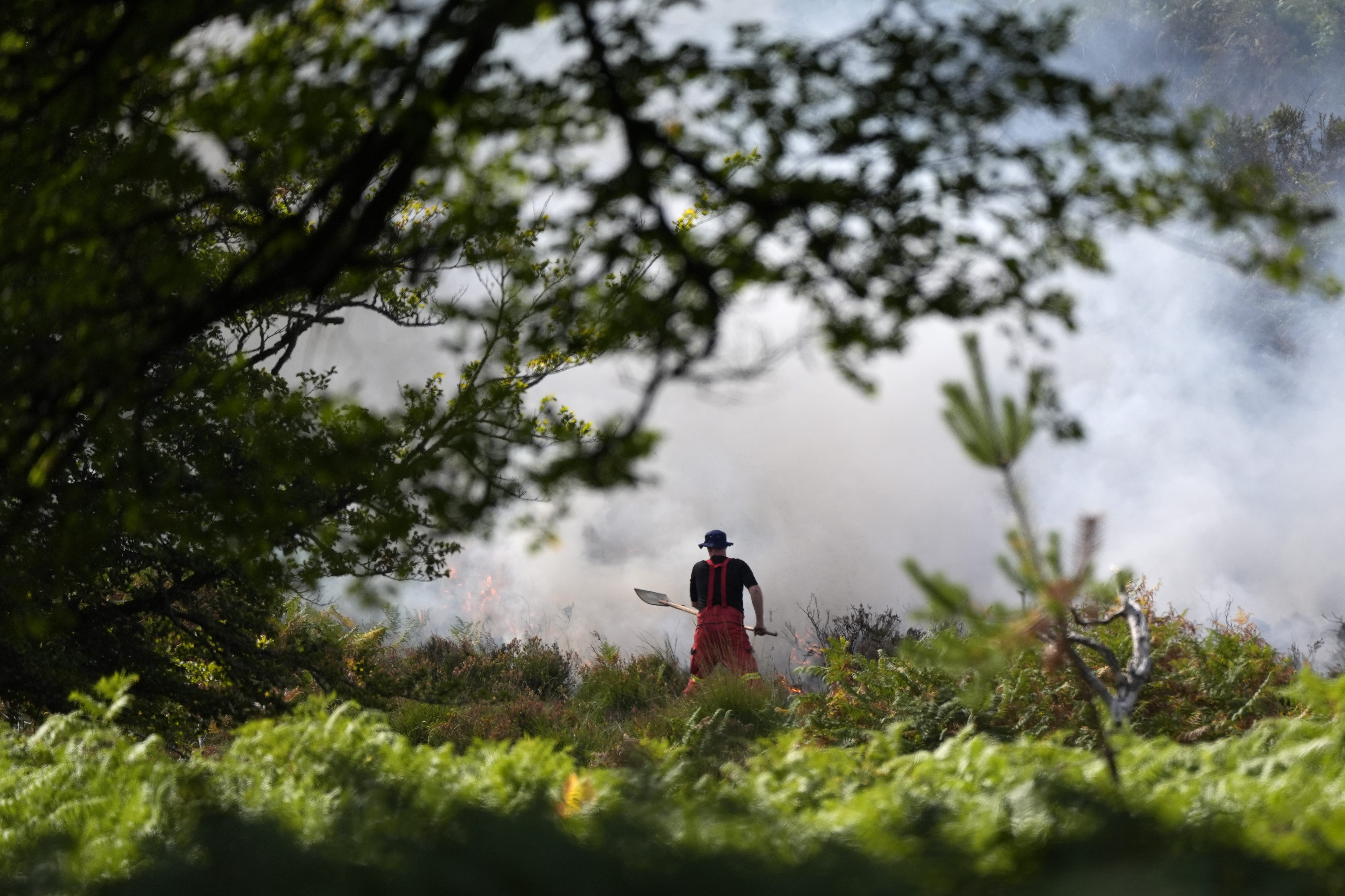 The blaze started on Sunday after a van caught fire nearby (Andrew Matthews/PA)