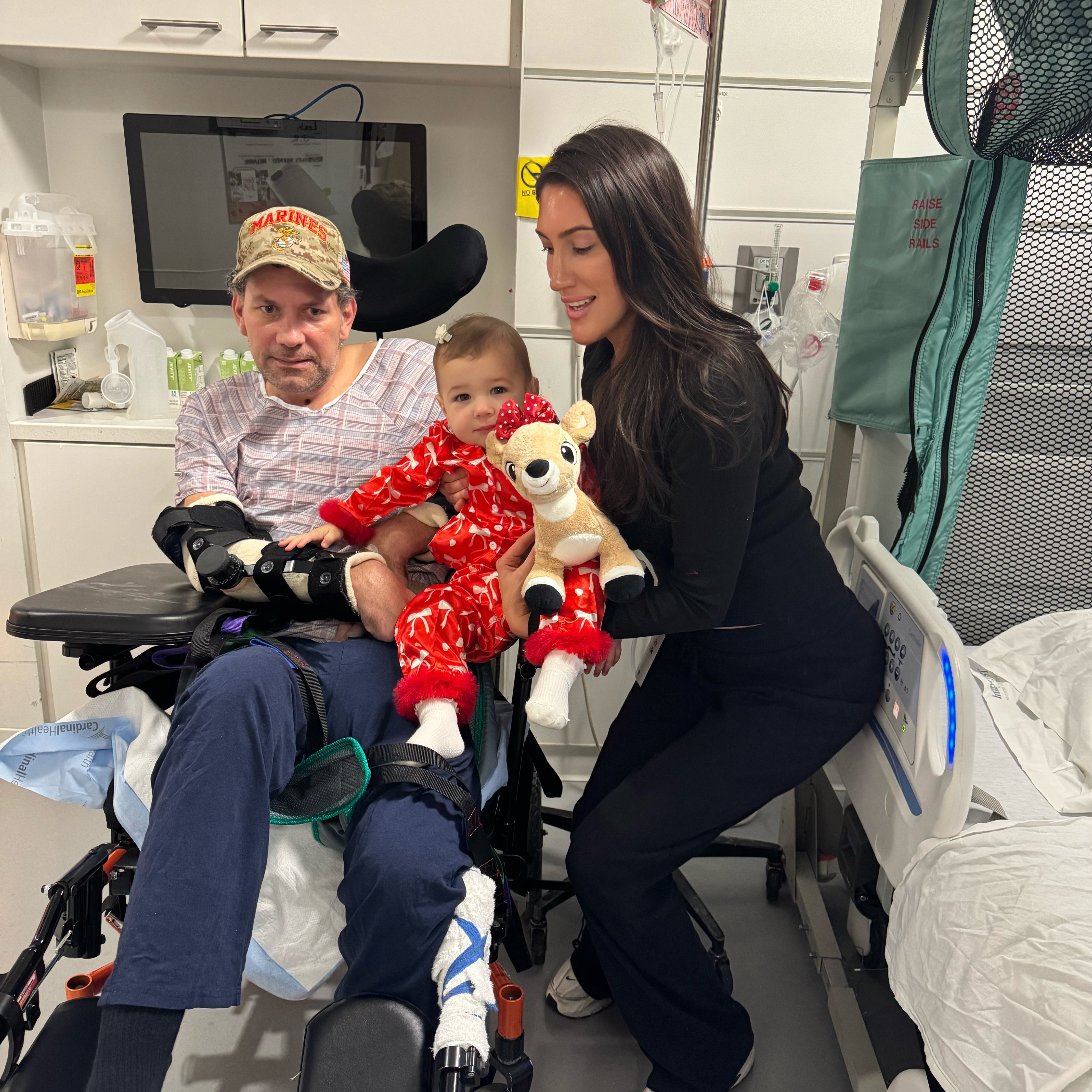 Joseph Belgio, pictured with fiancee Melanie Stayer and daughter Carmela, suffered brain damage after allegedly being served contaminated oysters at a suburban Chicago steakhouse