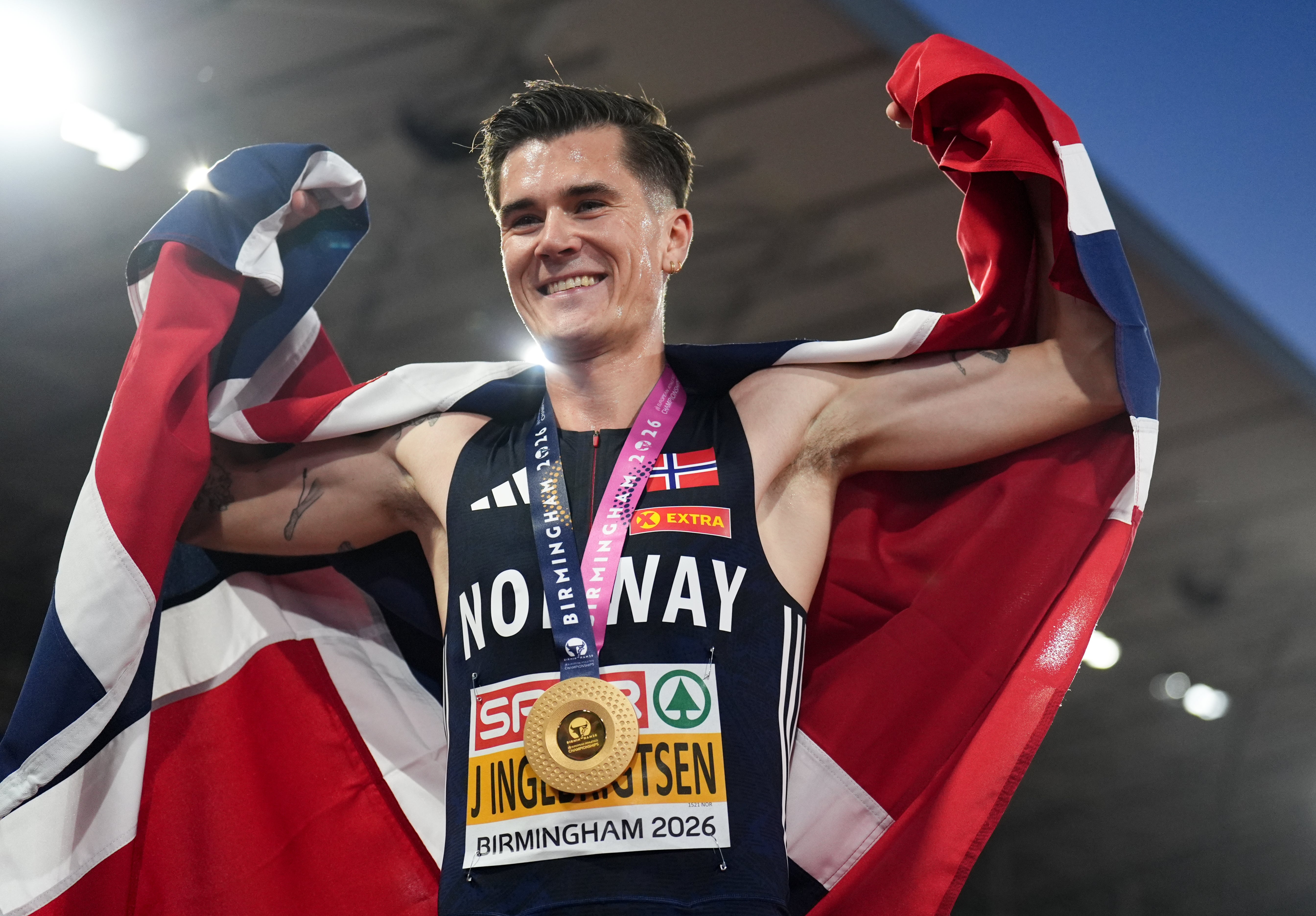 Jakob Ingebrigtsen of Norway with his medal after winning gold (Mike Egerton/PA)