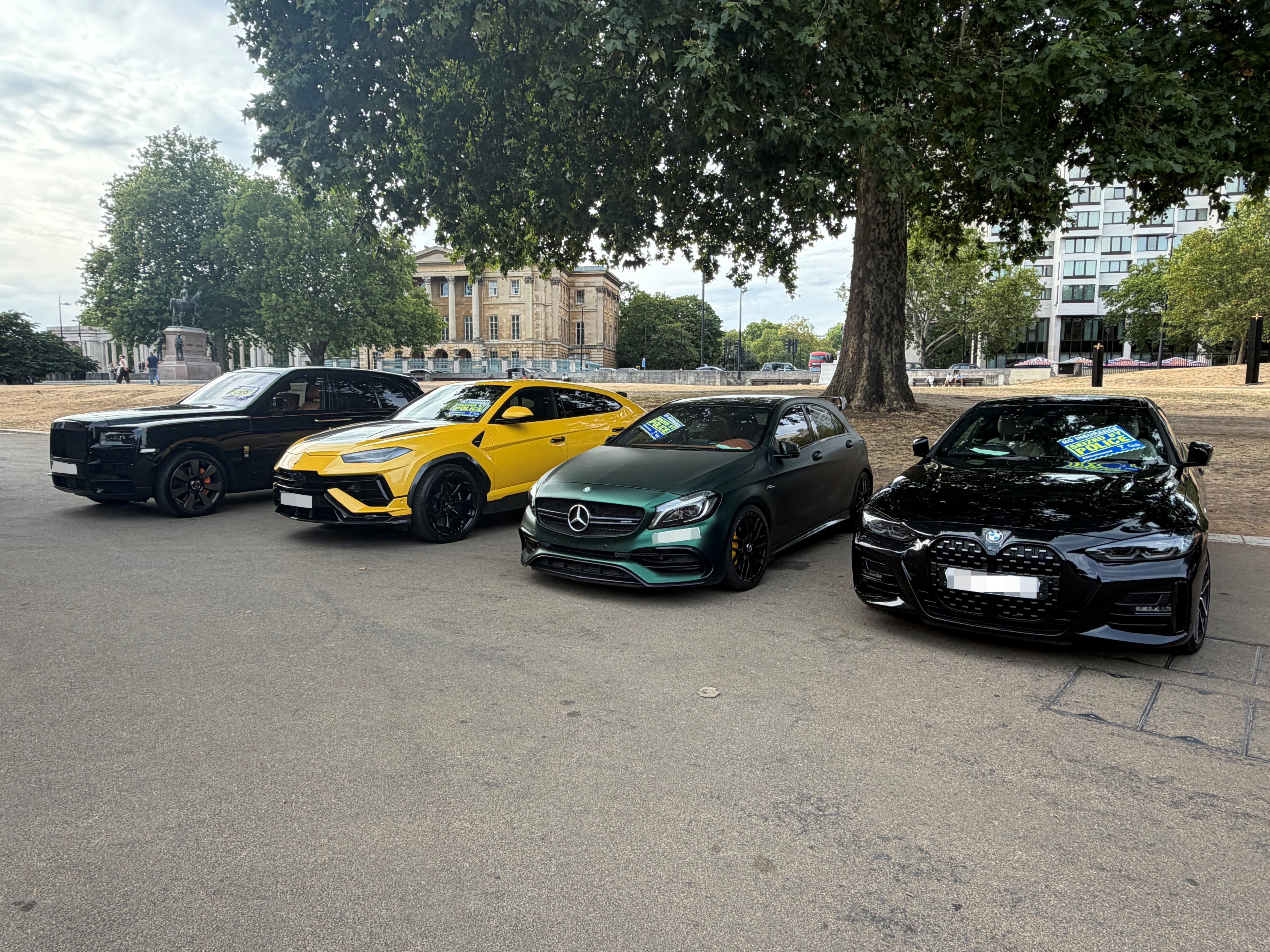 Seized vehicles including a Rolls Royce Cullinan and a Rolls-Royce Urus at Wellington Arch