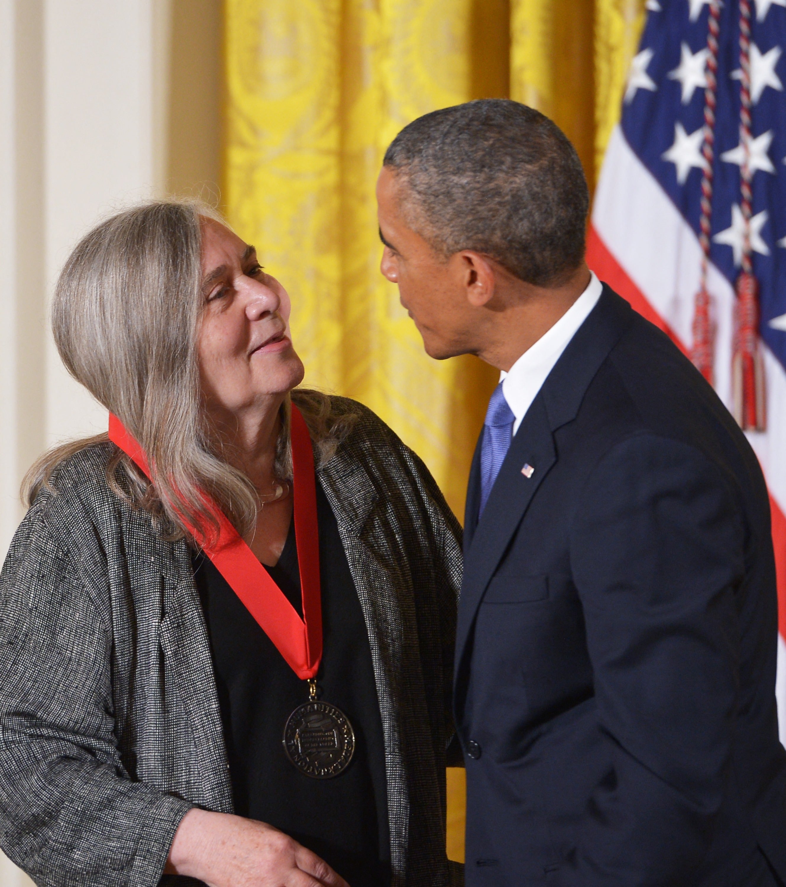 Barack Obama presents the 2012 National Humanities Medal to author Marilynne Robinson in 2013 (AFP/Getty)
