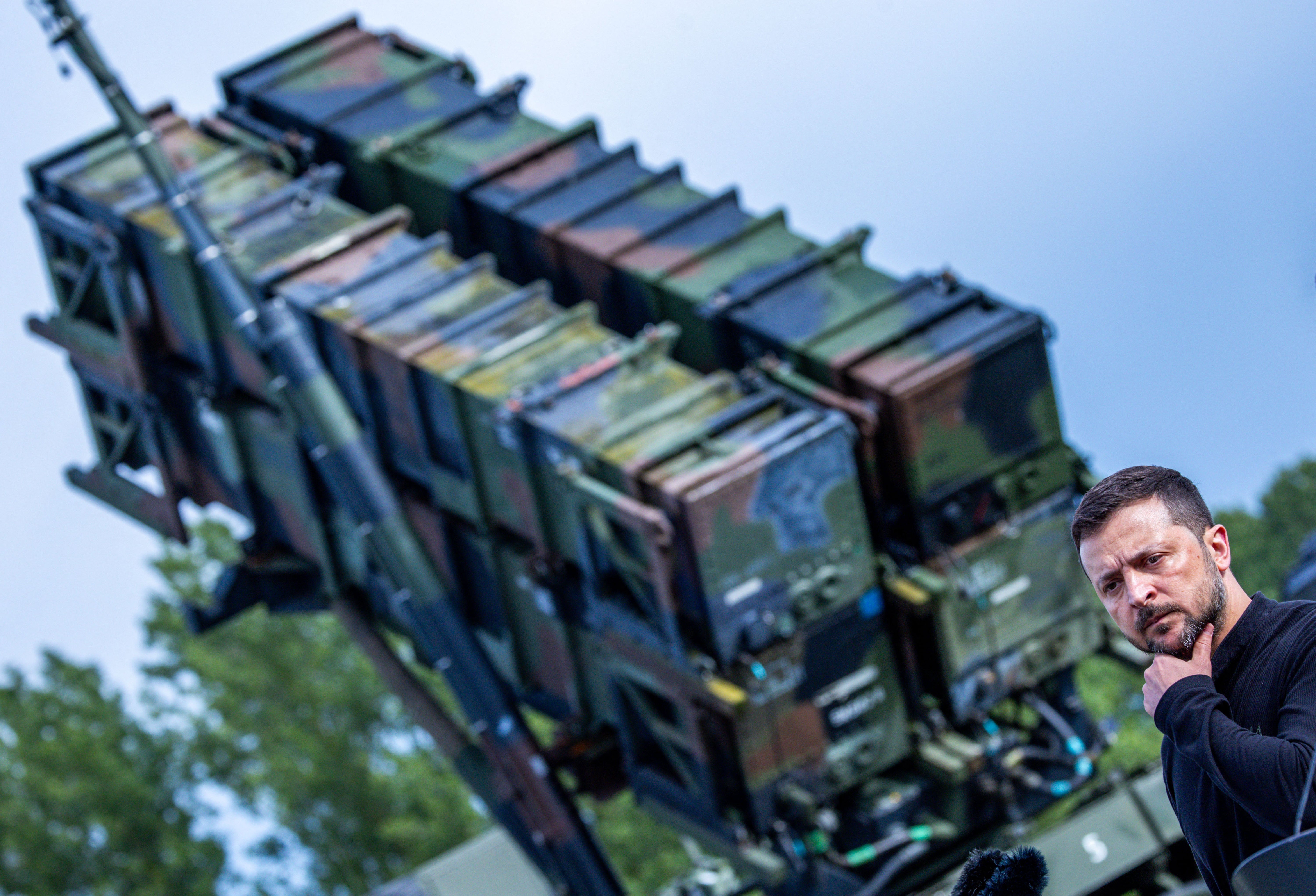Zelensky reacts as he hold a press statement after a visit to a military training area in north-eastern Germany, on June 11, 2024, where Ukrainian soldiers are trained on the 'Patriot' air defence missile system