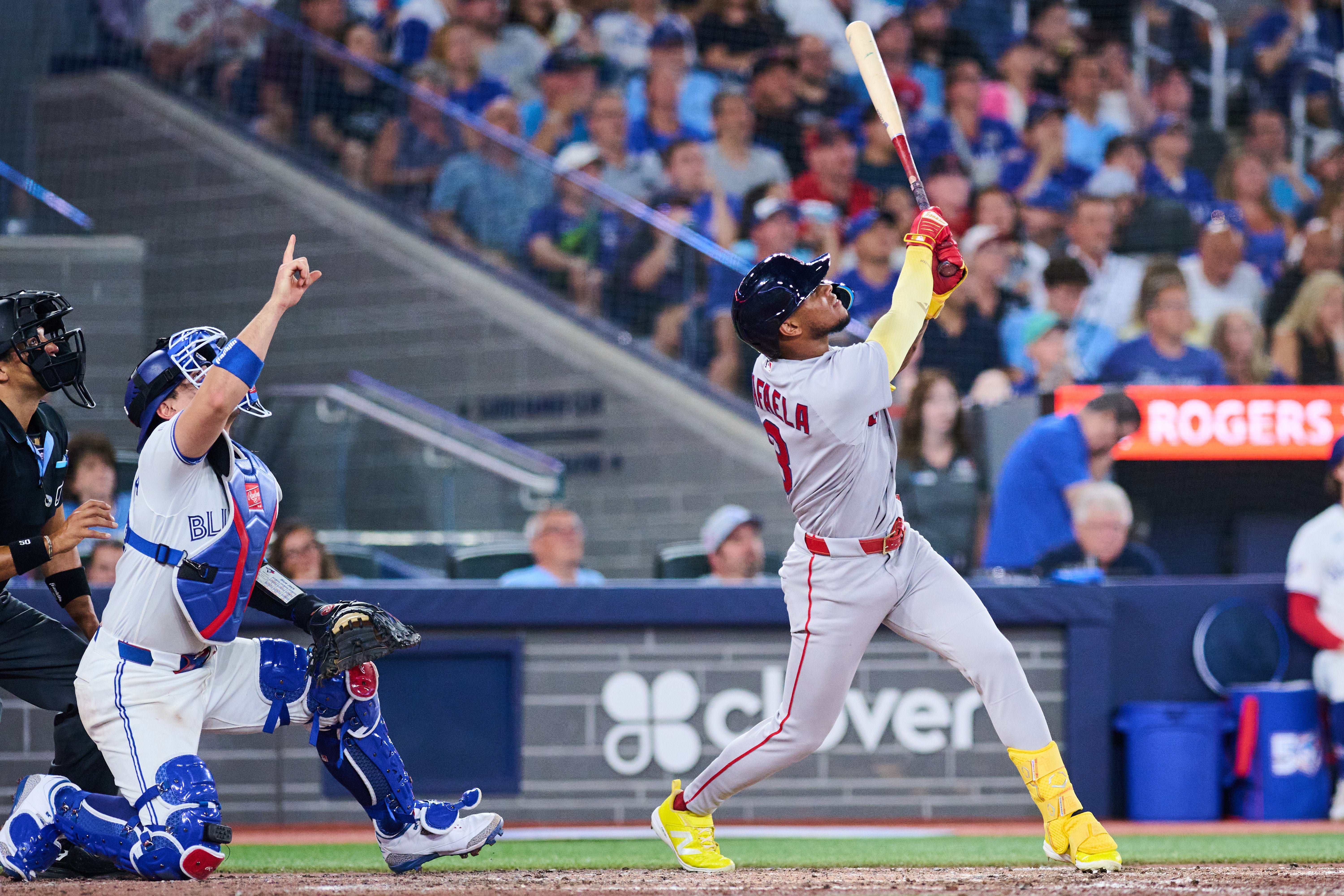 Boston Red Sox's Ceddanne Rafaela, right, flies into a sacrifice double play that was reviewed with a time play allowing Anthony Seigler (not shown) to score (AP)