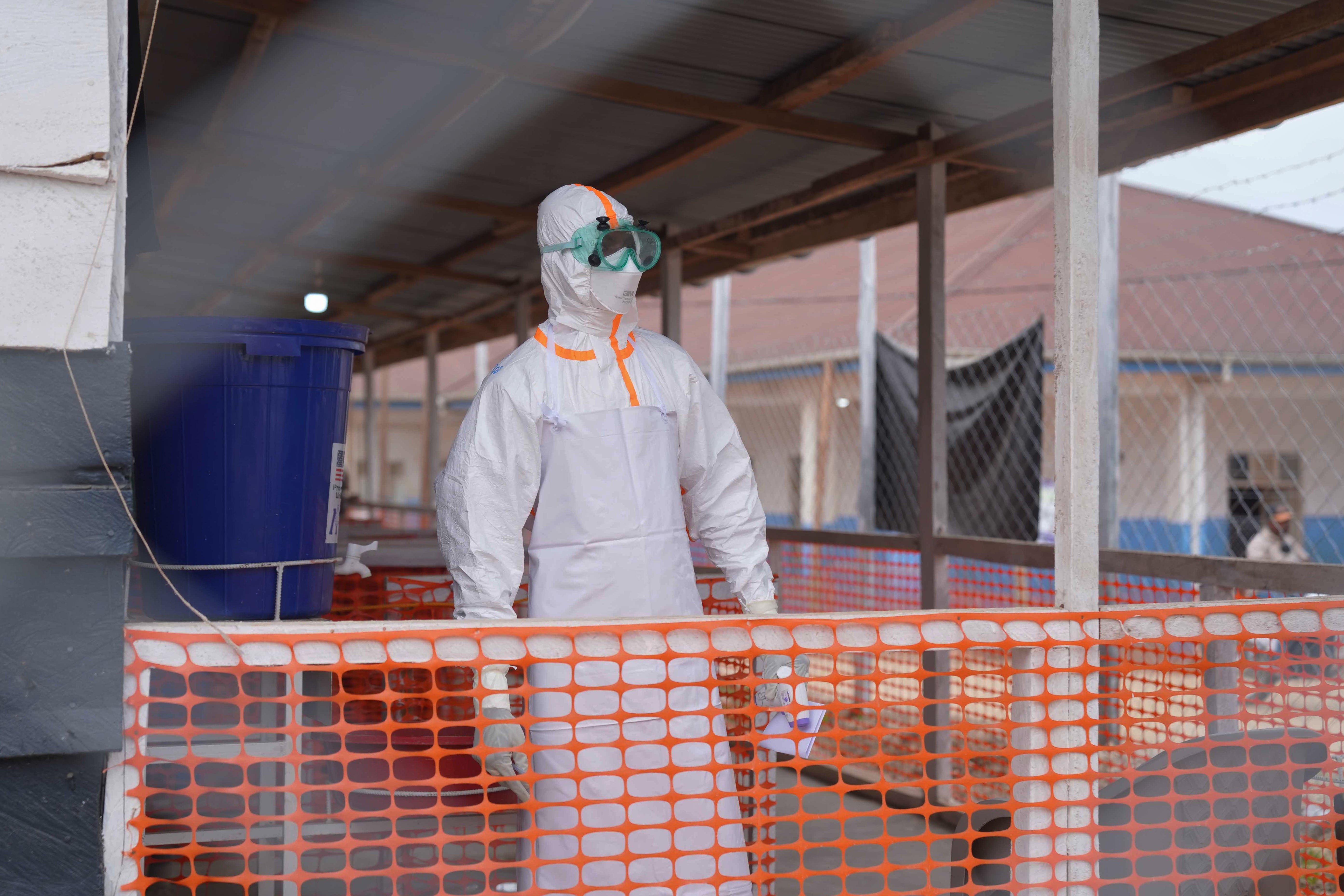 A health worker in protective gear (AP)