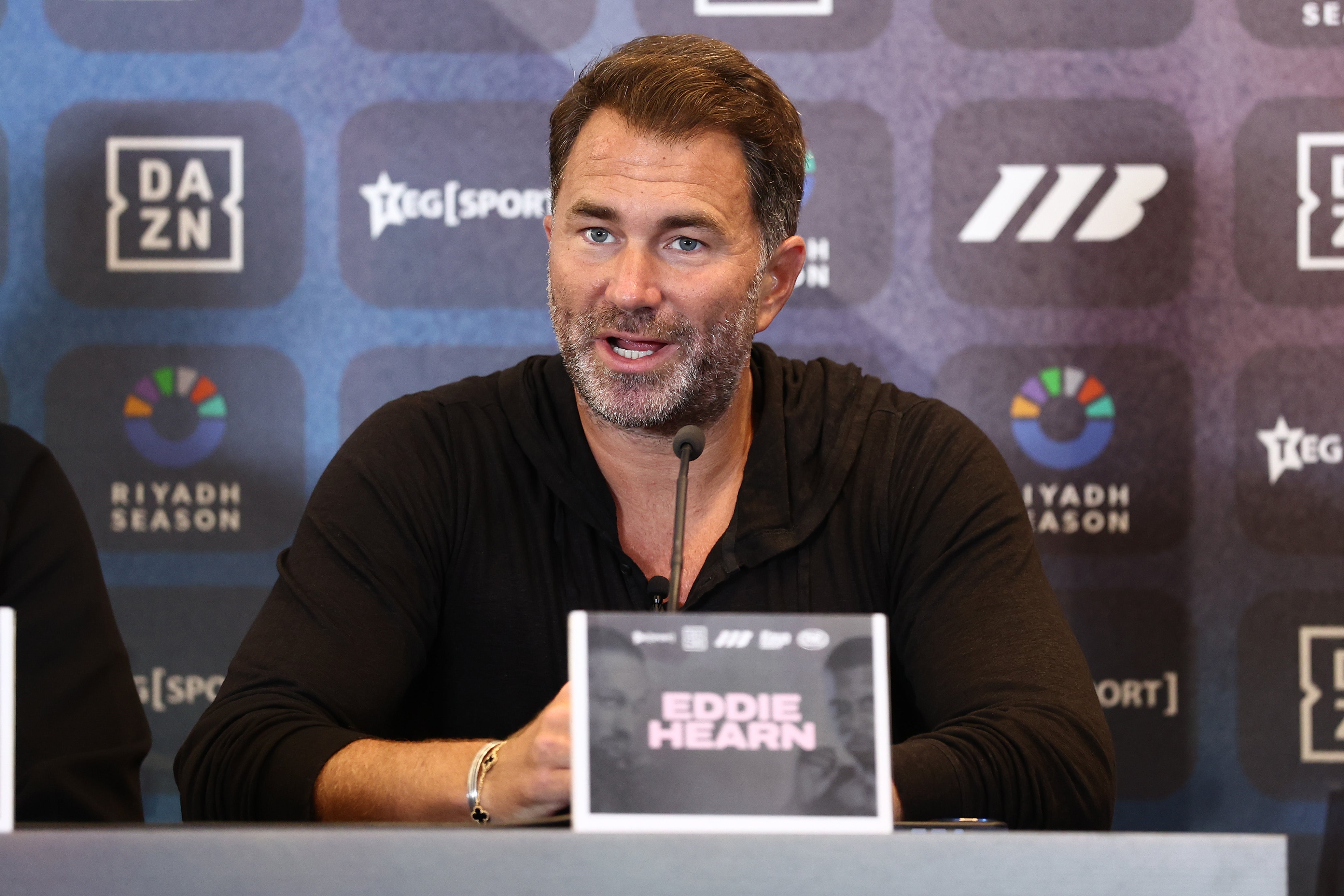 Boxing promoter Eddie Hearn has signed Machado Garry to his talent agency