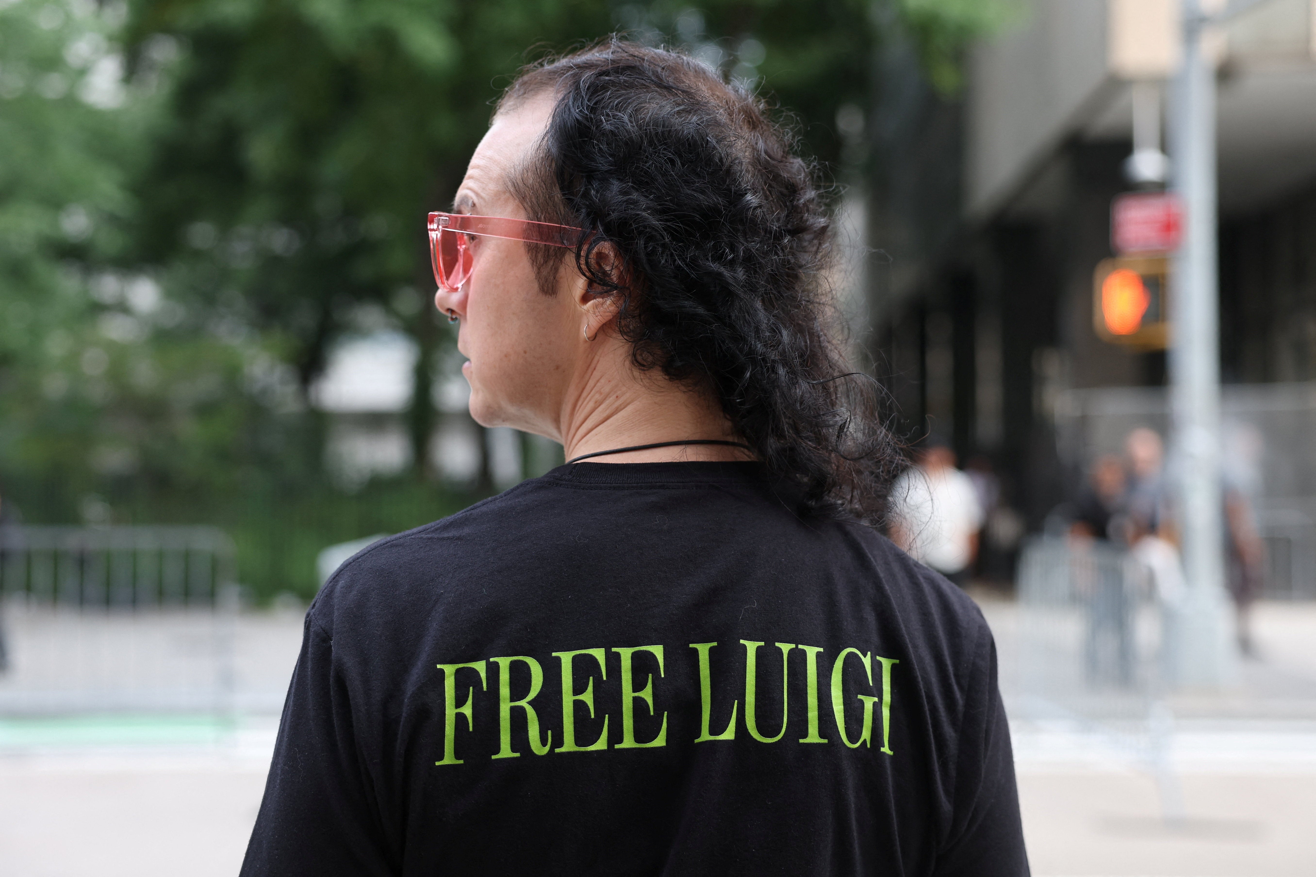 Mangione supporters have repeatedly shown up to court with ‘Free Luigi’ merchandise to display their support for the 28-year-old but no fans appeared to be wearing supportive shirts or holding signs on Friday (Reuters)