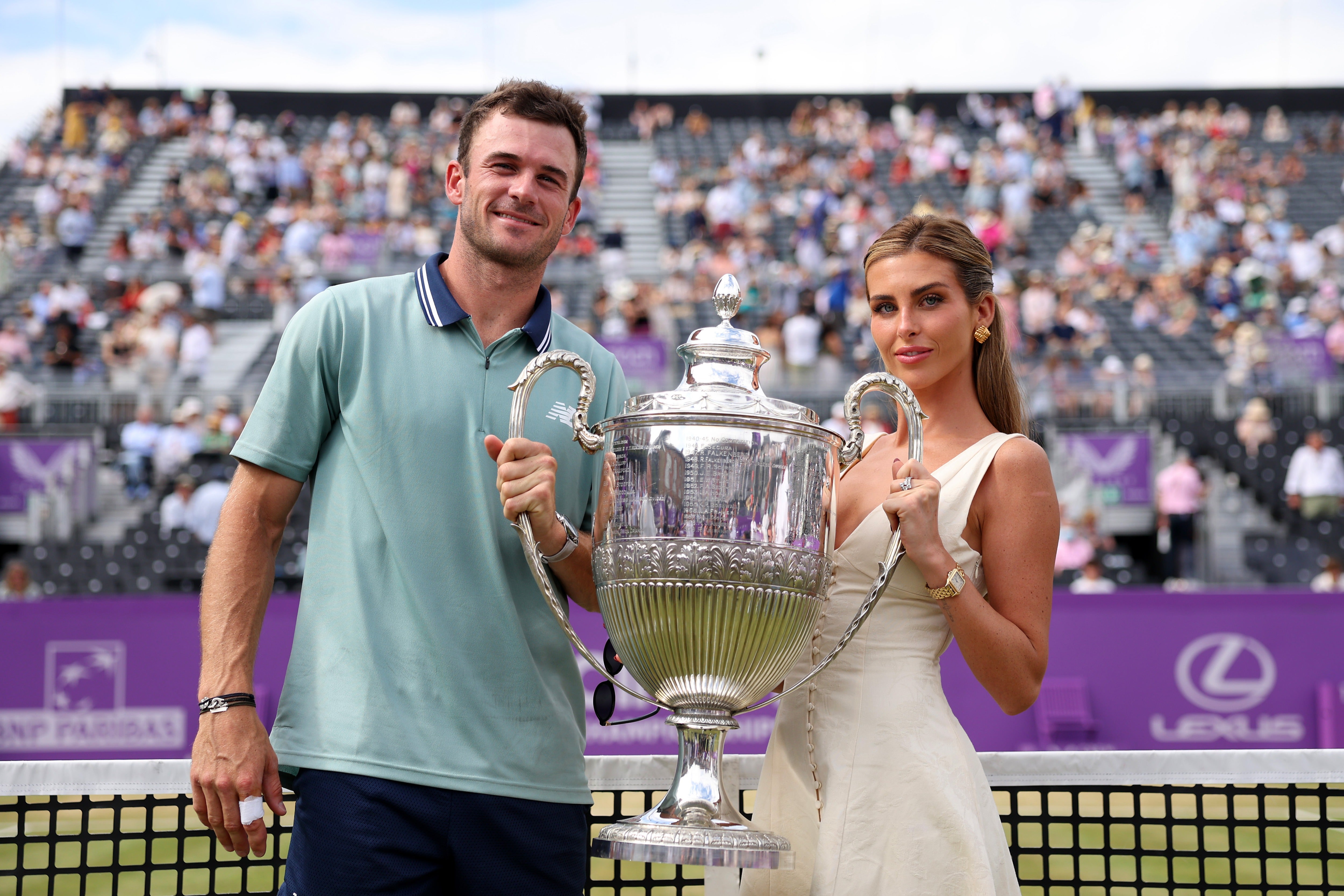 Tommy Paul with Paige Lorenze after his Championships 2024 win in London. The couple wed this summer, and she took his last name